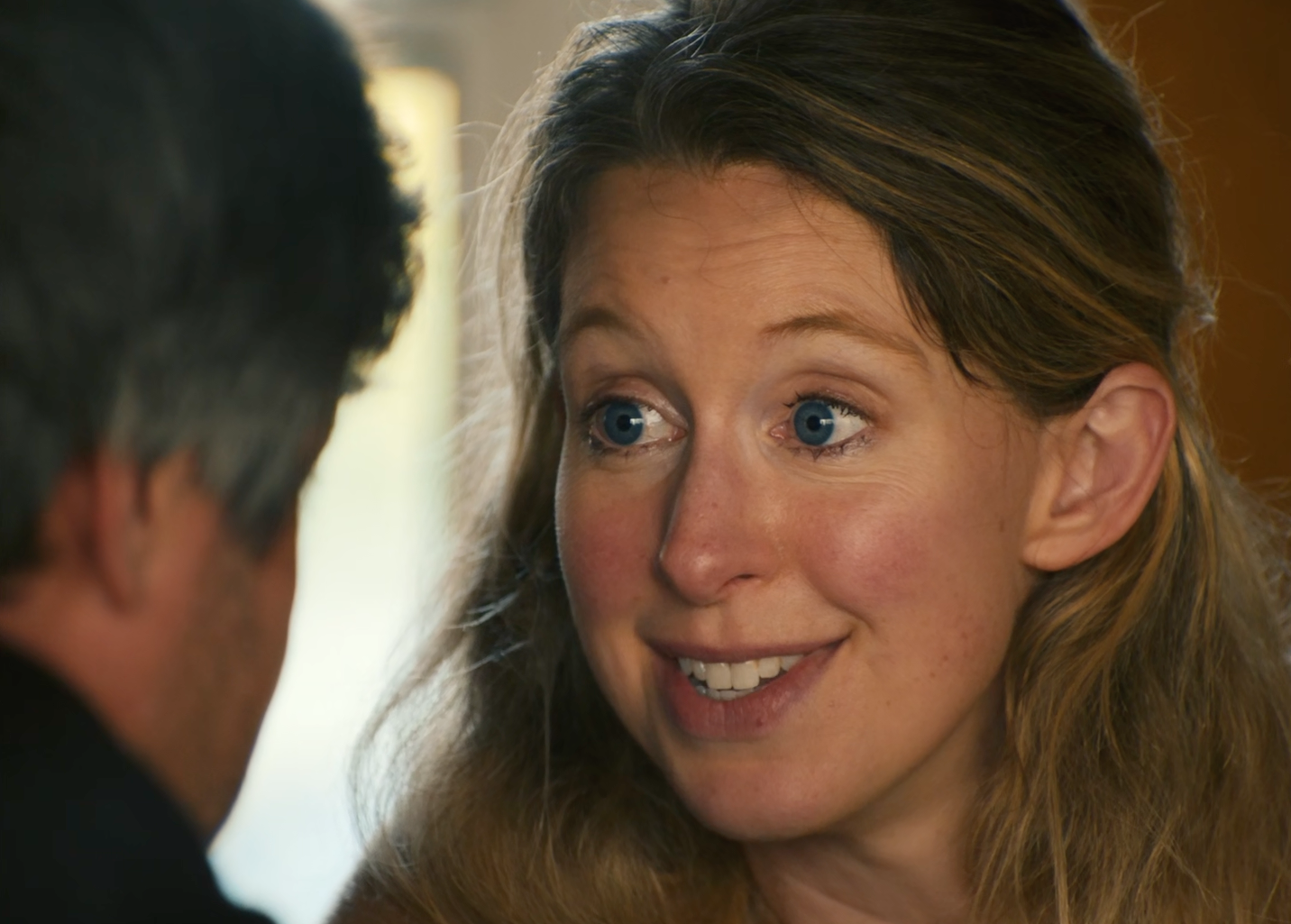 Close up of Elizabeth Holmes speaking to Nathan Fielder in "You Can See Everything"