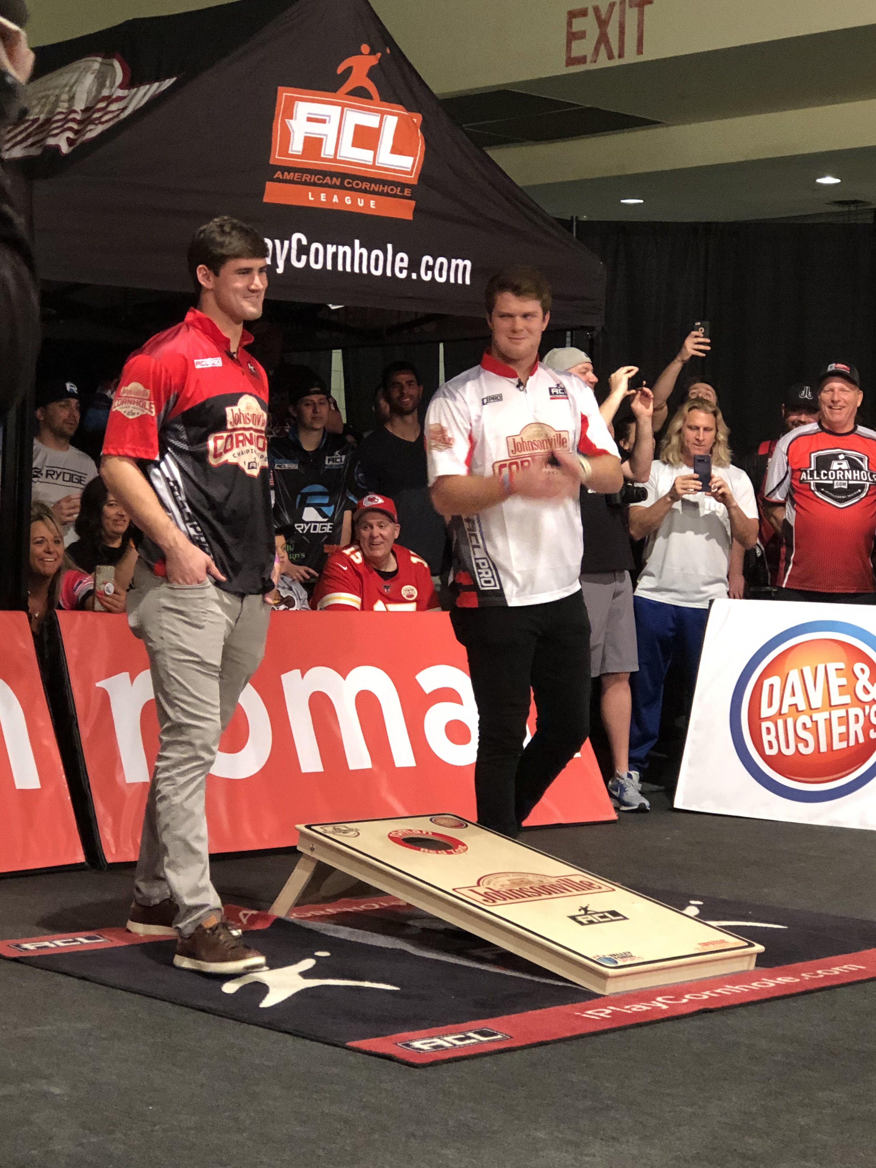 Daniel Jones and Sam Darnold playing cornhole