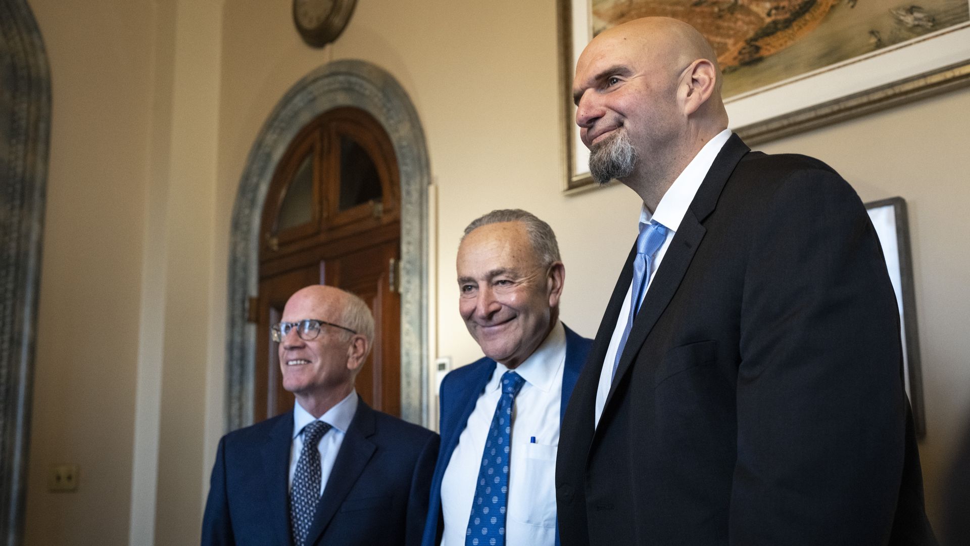 John Fetterman towers over Chuck Schumer and Peter Welch