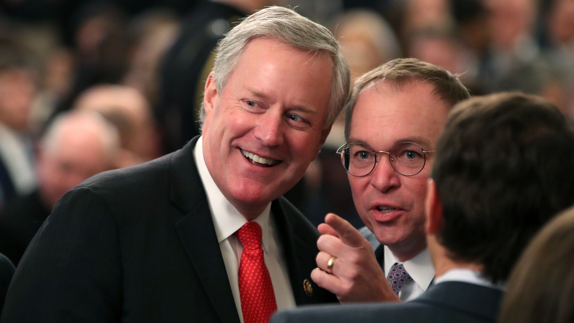 In this image, Mulvaney and Meadows talk
