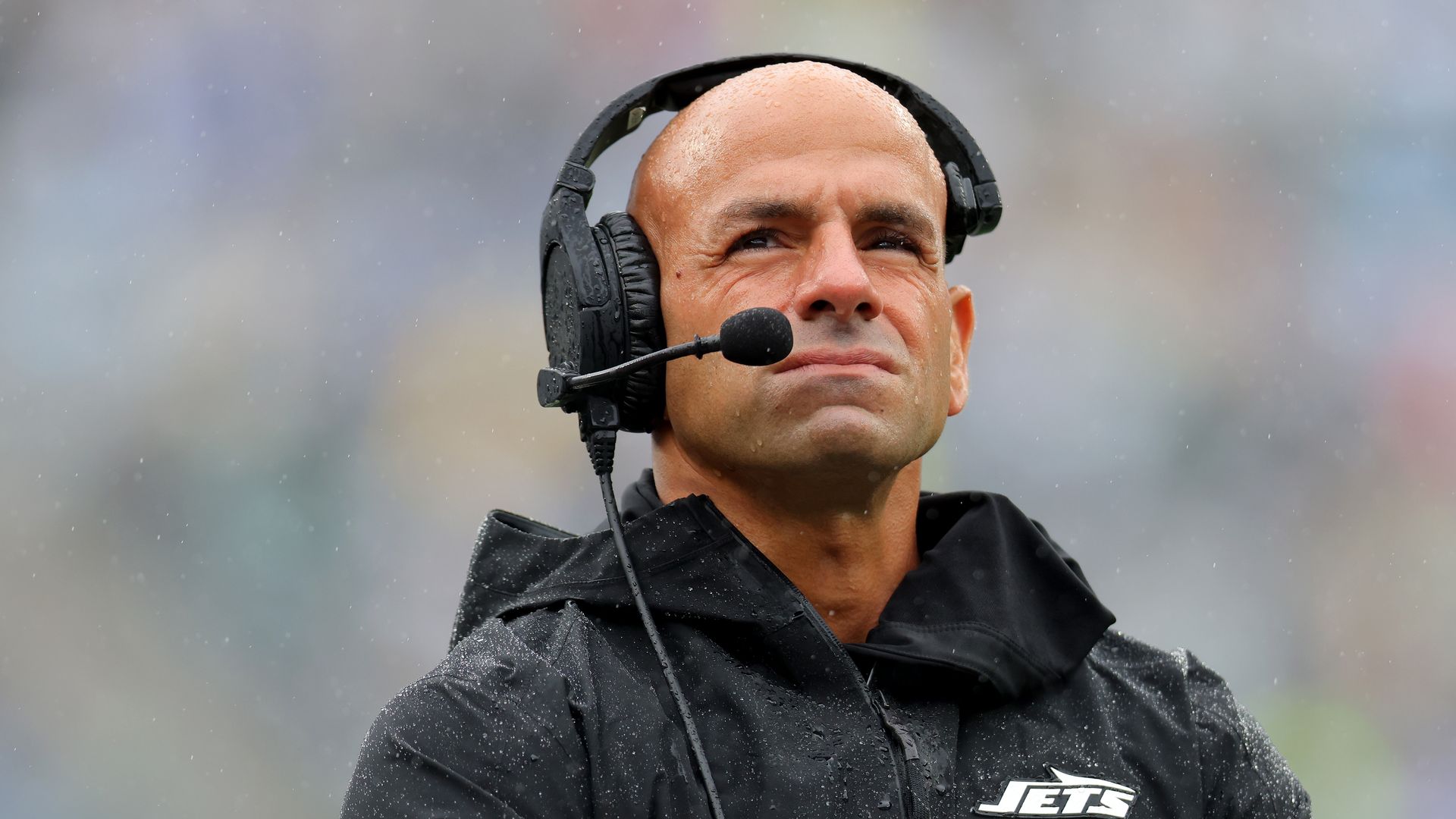 Robert Saleh looks on during a rainy New York Jets game against the Denver Broncos during the first half at MetLife Stadium on September 29, 2024 in East Rutherford, New Jersey.