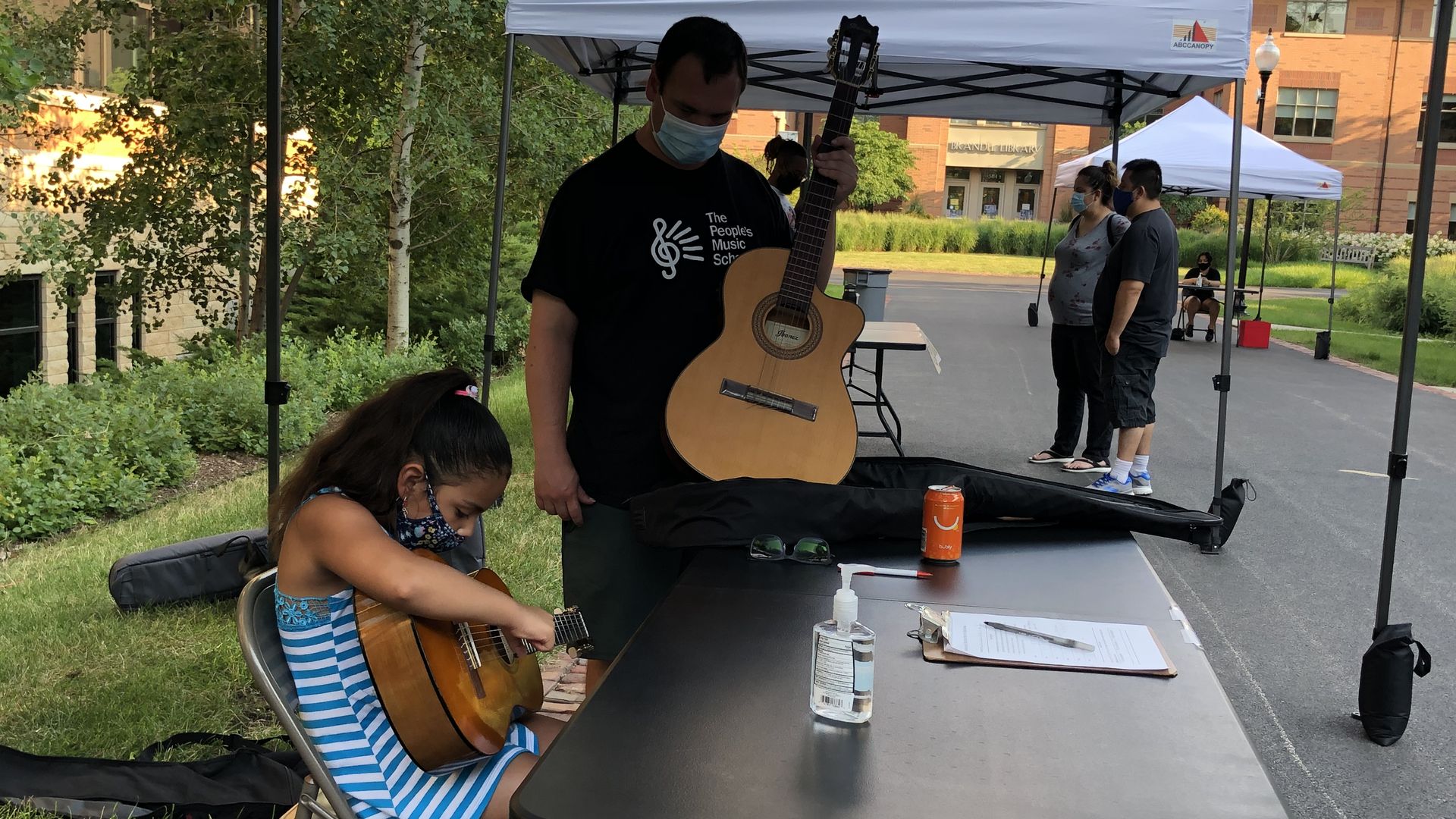 Kid learning guitar