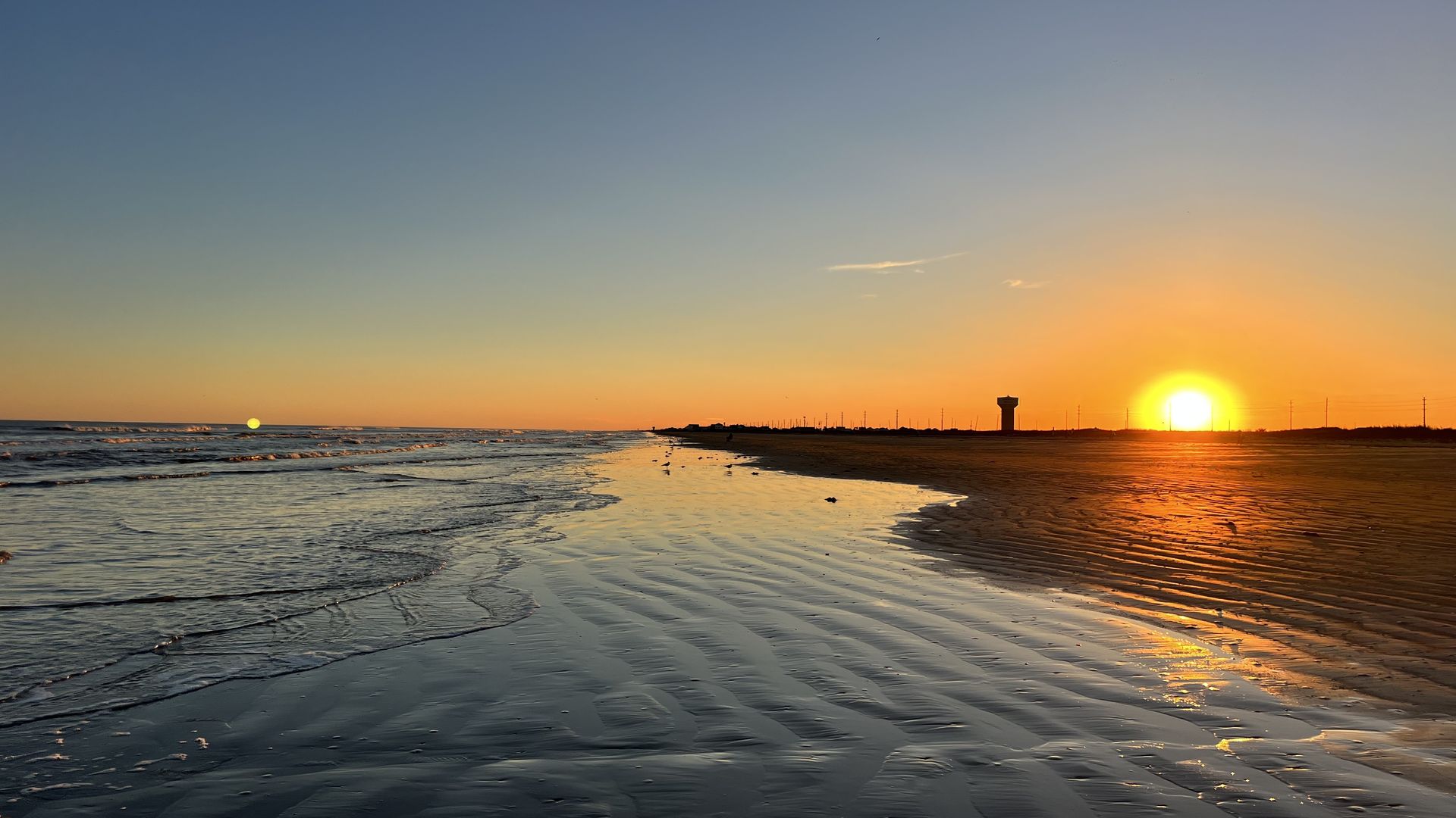 Photo of a sunset on the beach. 