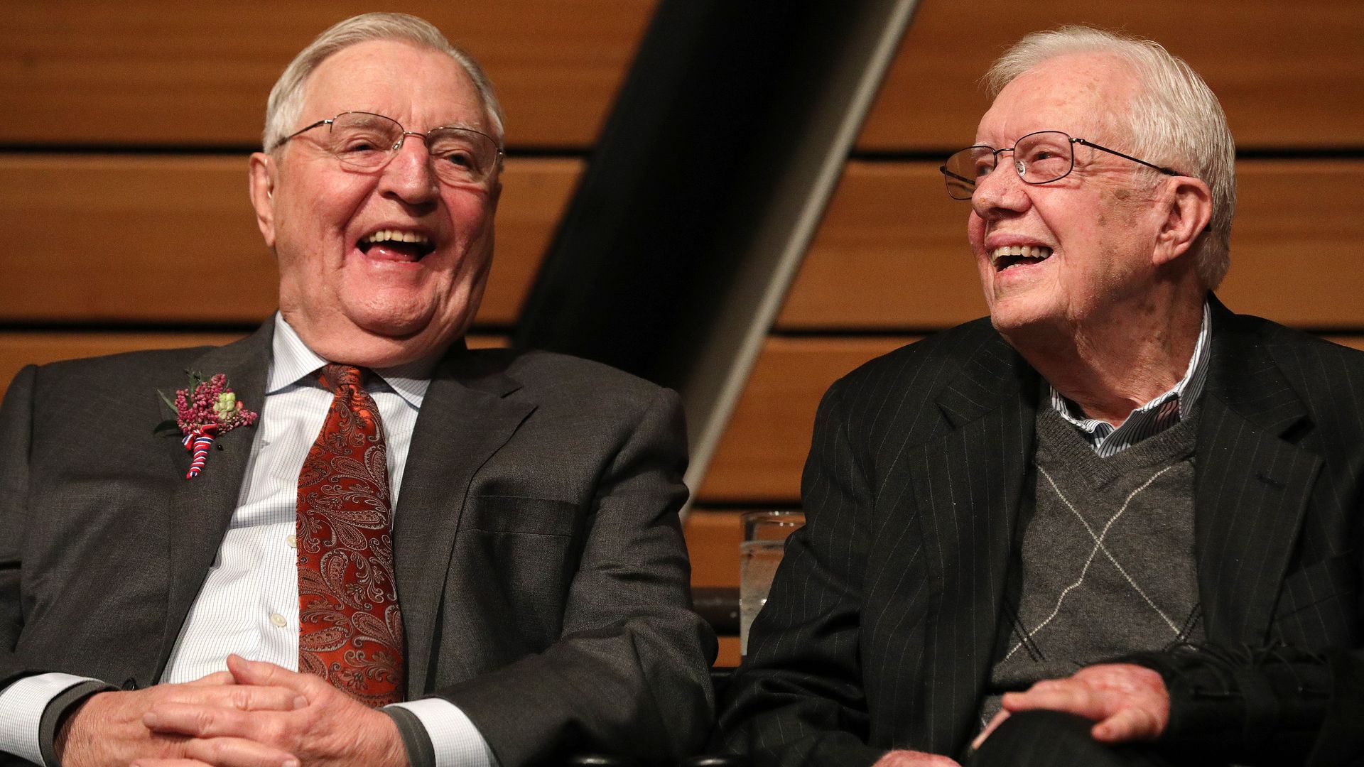 Walter Mondale and Jimmy Carter sit next to each other