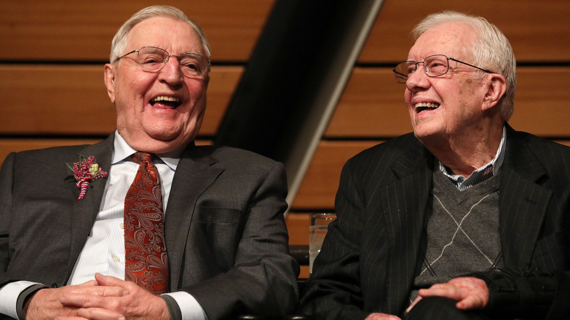 Walter Mondale and Jimmy Carter sit next to each other