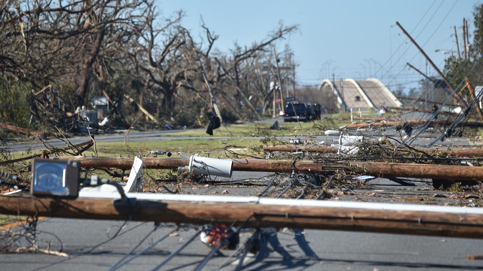 Fallen electrical poles block a road in the aftermath of Hurricane Michael on October 12, 2018 in Panama City, Florida.