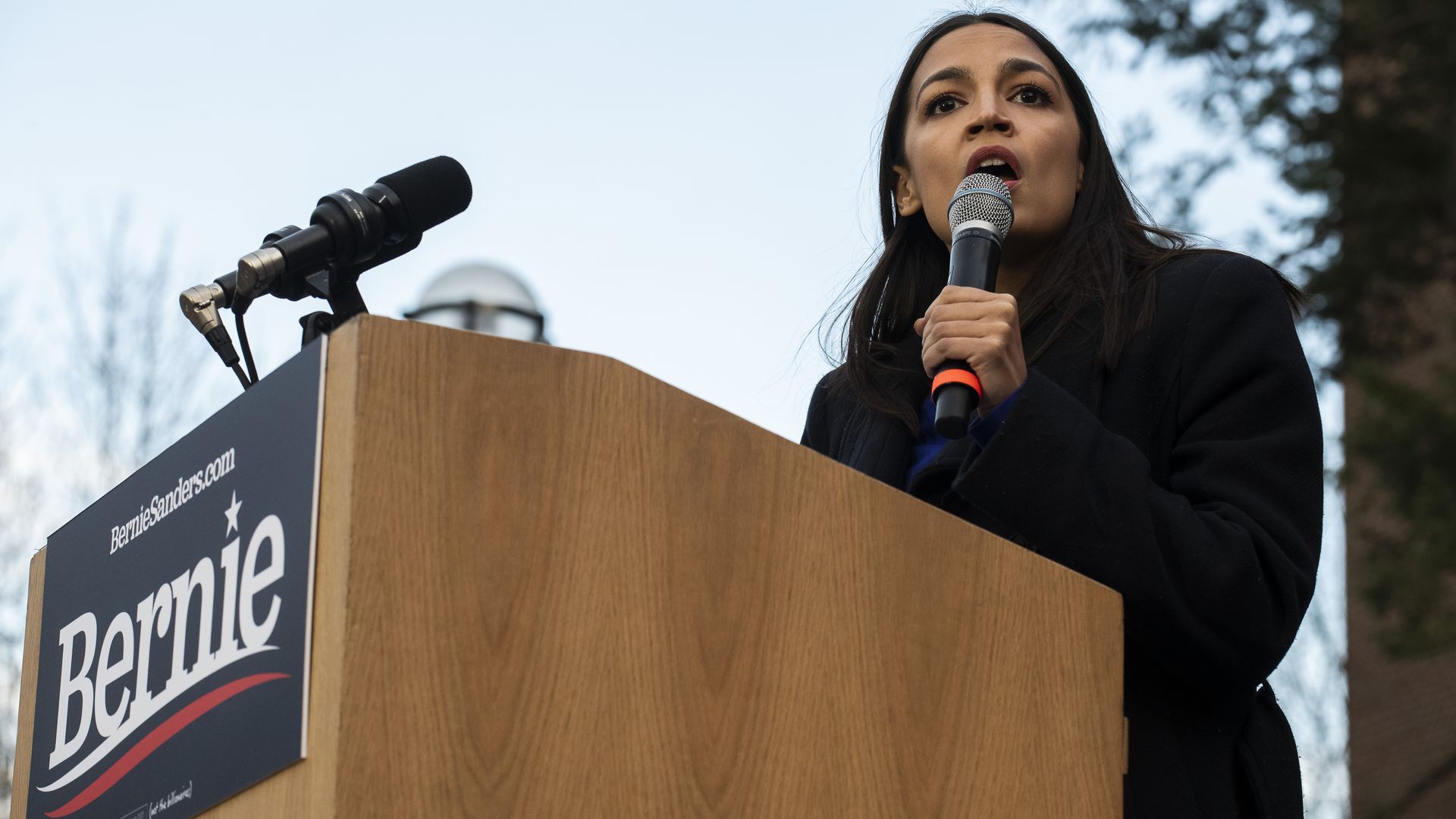 Rep. Alexandria Ocasio-Cortez (D-NY) addresses supporters during a campaign rally for Democratic presidential candidate Sen. Bernie Sanders