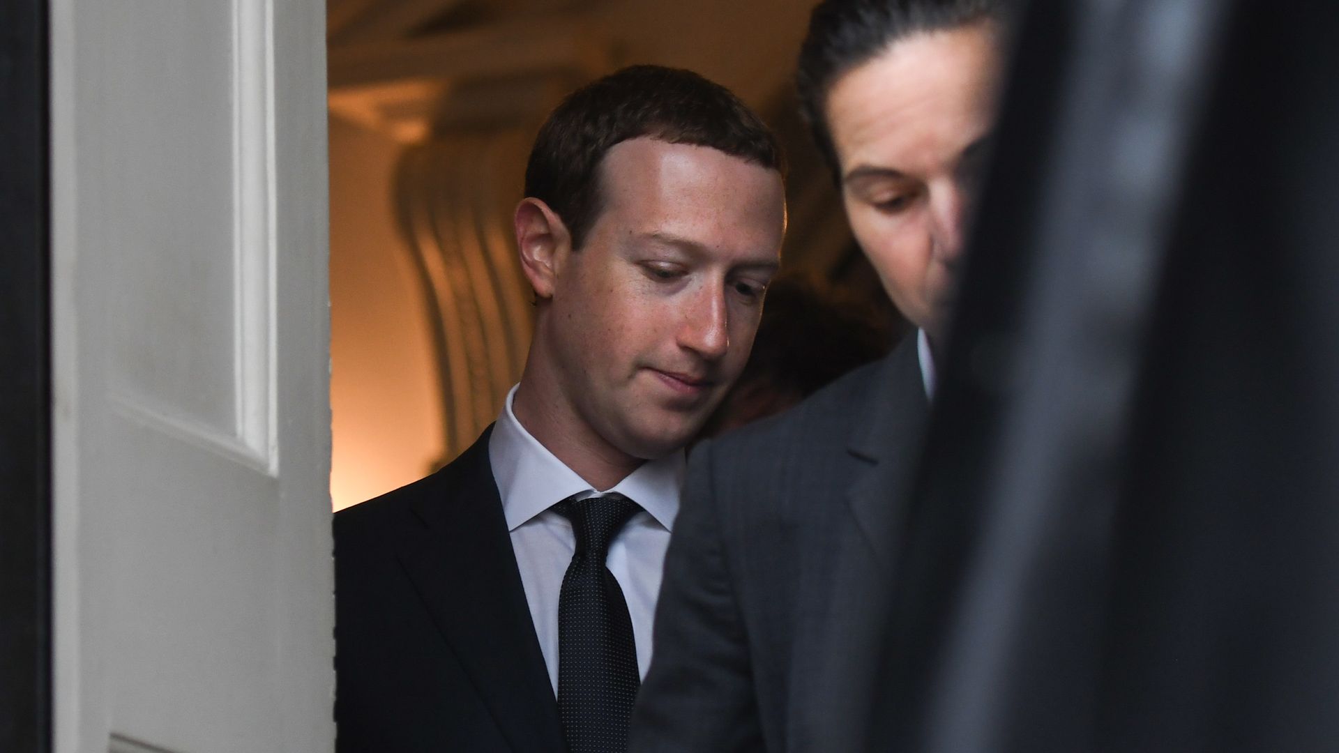 A man exits a building