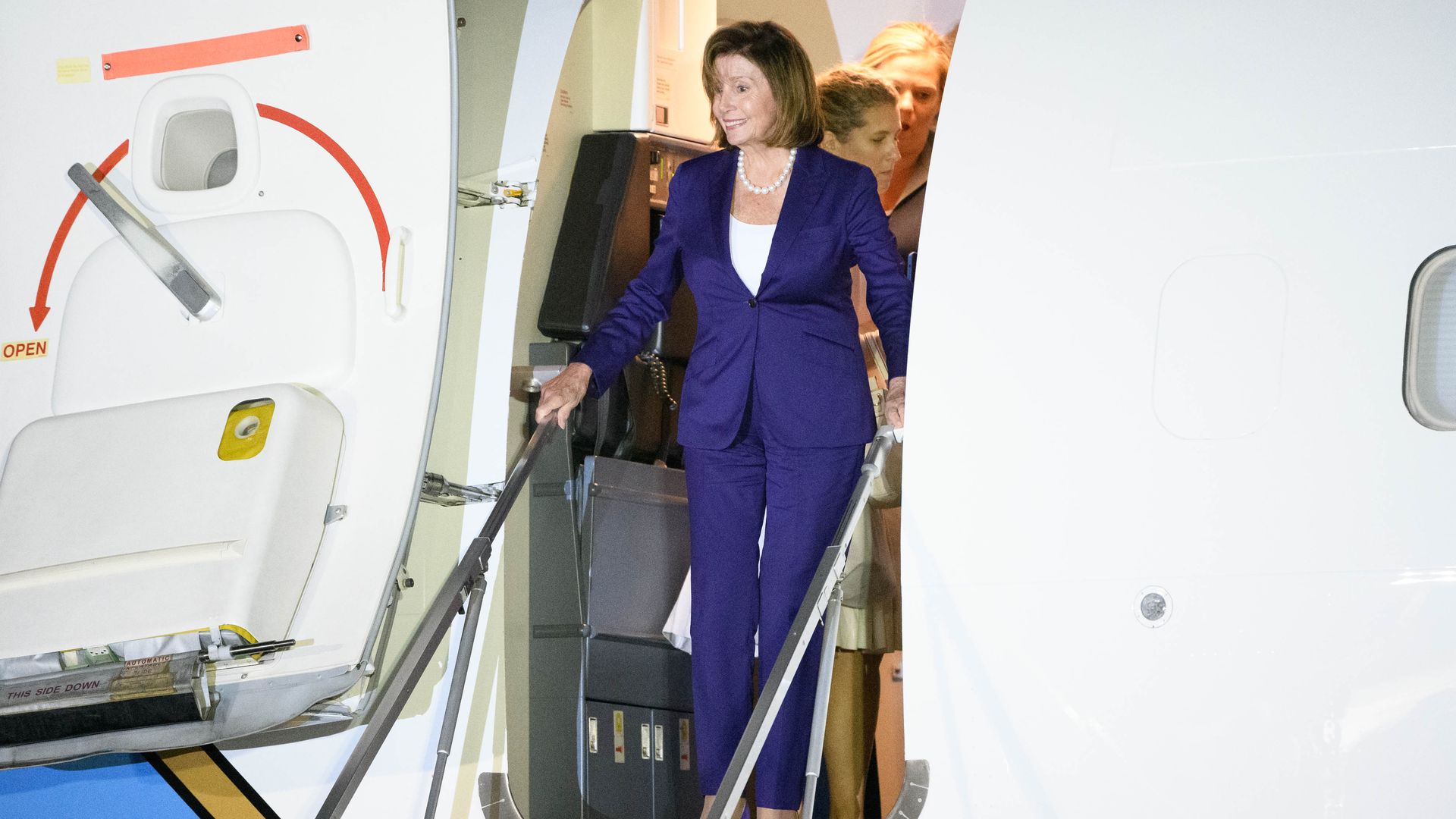 House Speaker Nancy Pelosi disembarking a plane in Fussa, Japan, on Aug. 4.