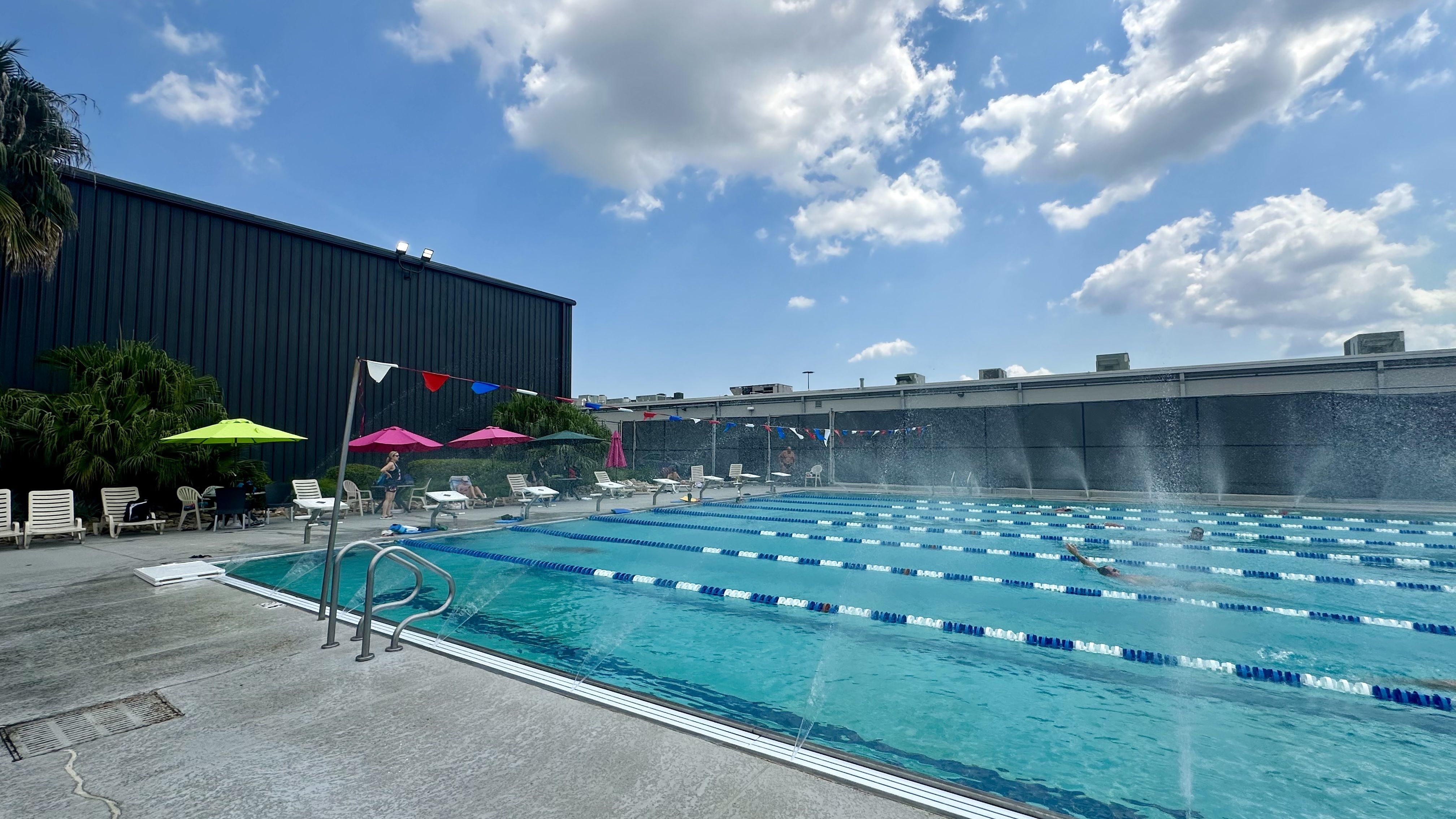 Photo shows a pool with swimming lanes