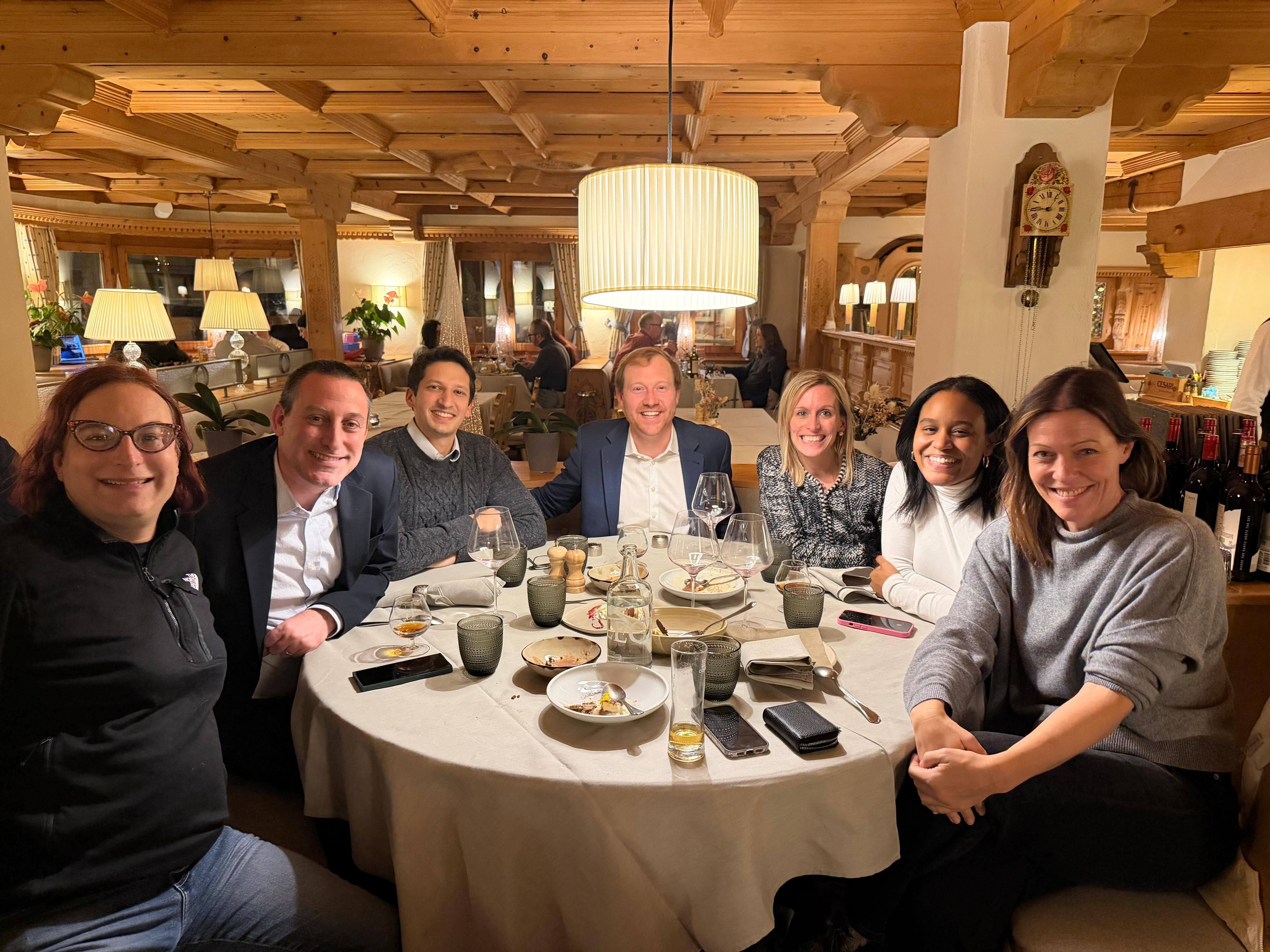 People smiling at dinner