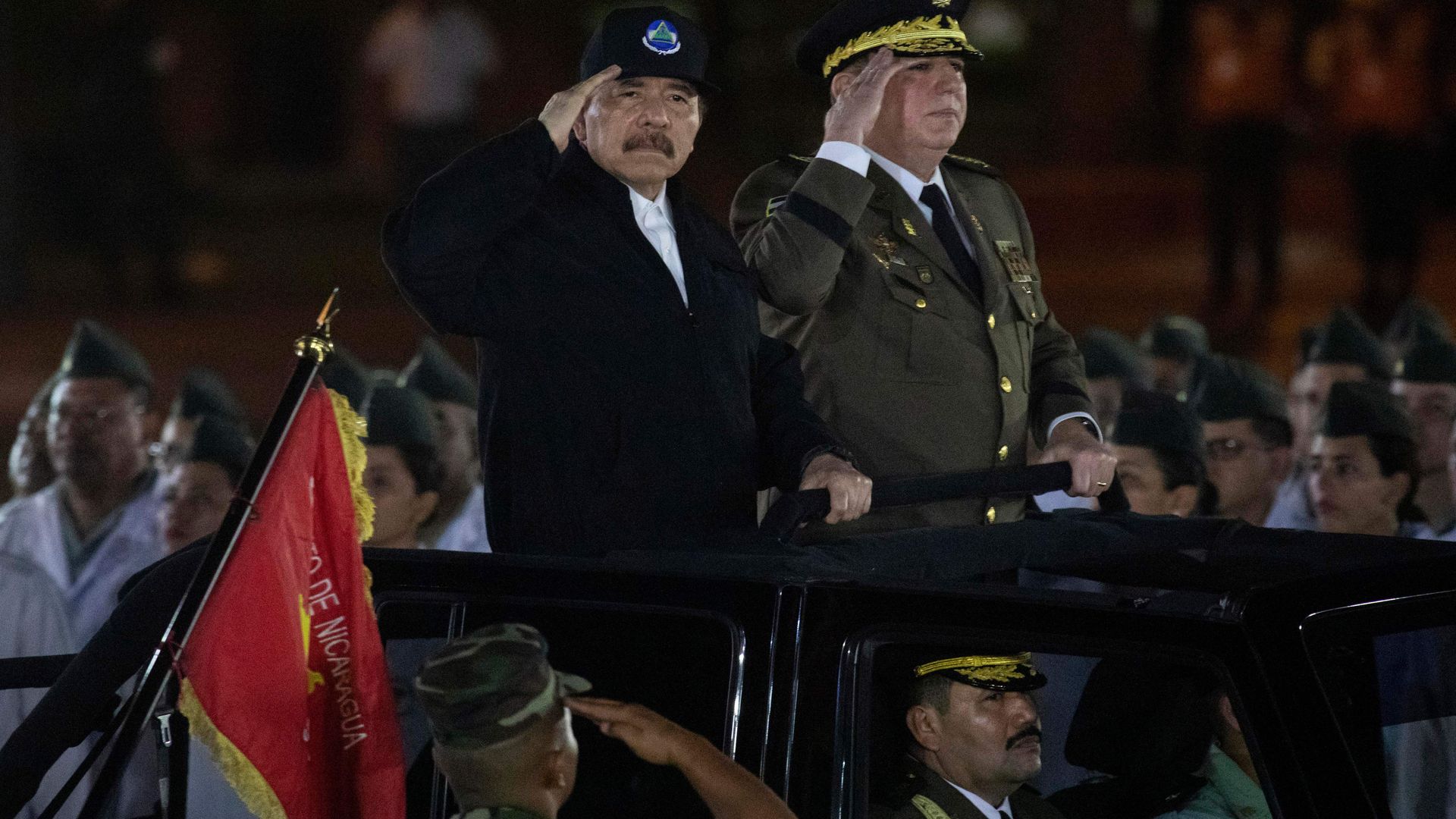  Nicaragua's President Daniel Ortega (L) and Commander in Chief of the Nicaraguan Army General Julio Aviles salute during a ceremony at Revolution Square in Managua, on February 21, 2020.