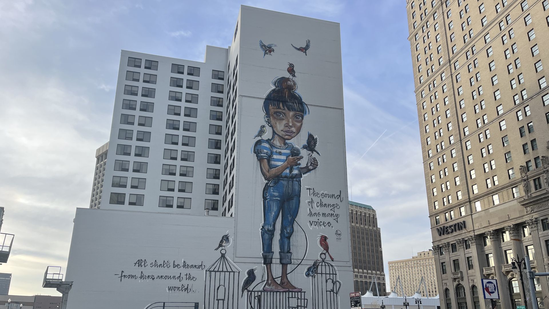 A mural by artist Hera celebrating gender equality on the back of Detroit's Hotel Indigo, 1020 Washington Blvd.