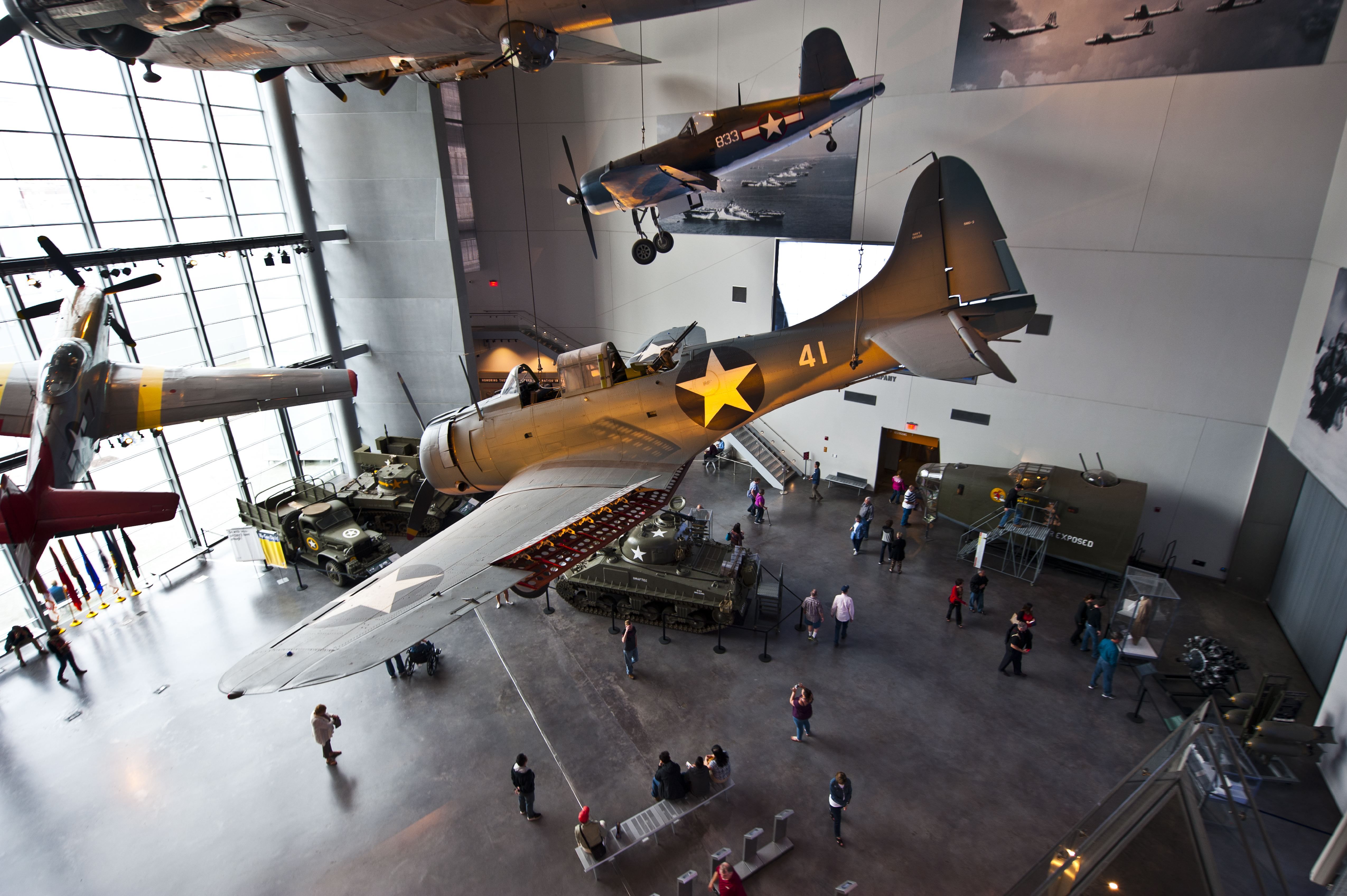 Photo shows planes hanging from the ceiling at the National WWII Museum.
