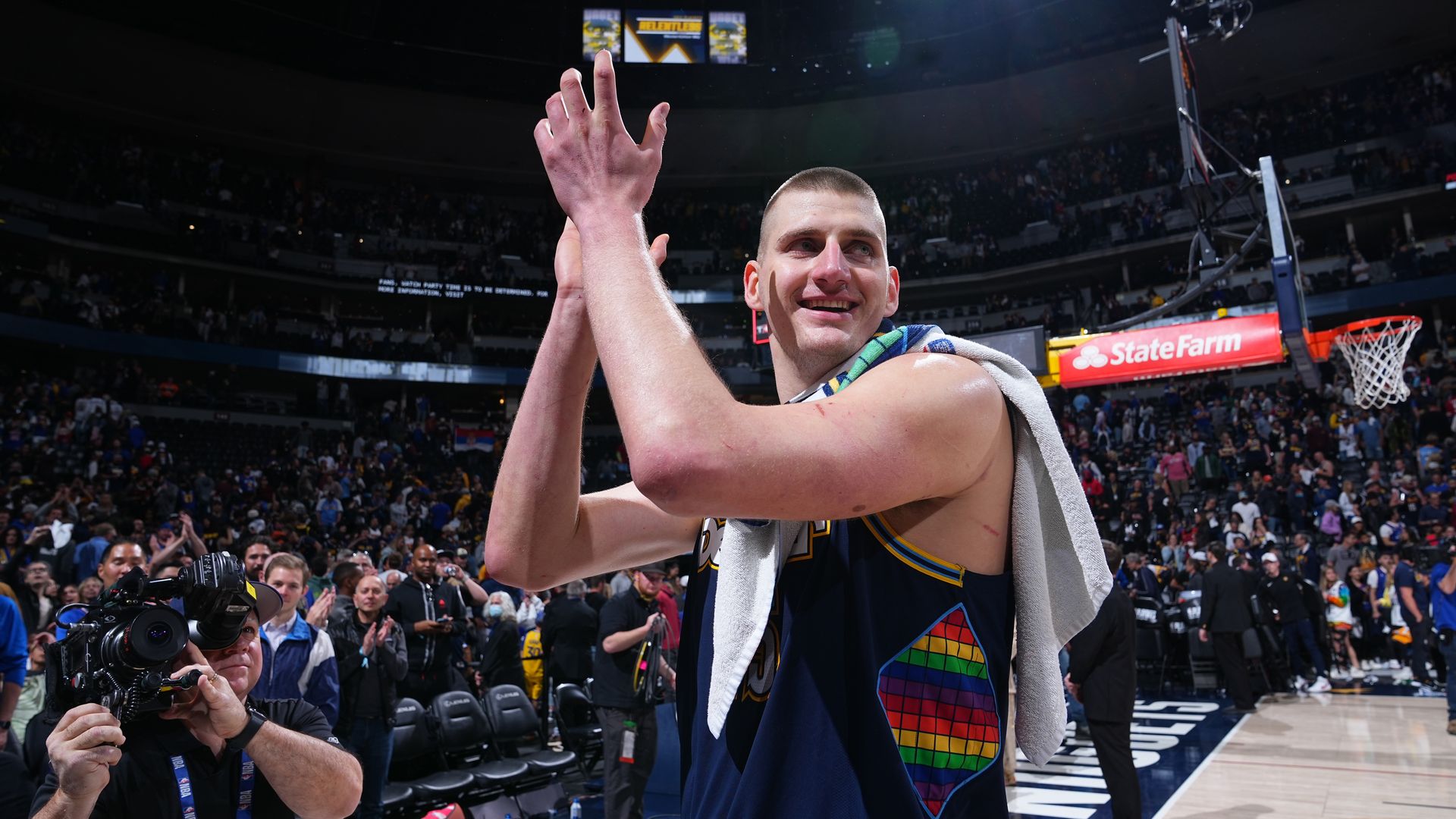 Nikola Jokic walks off the court after a playoff win. Photo: Garrett Ellwood/NBAE via Getty Images
