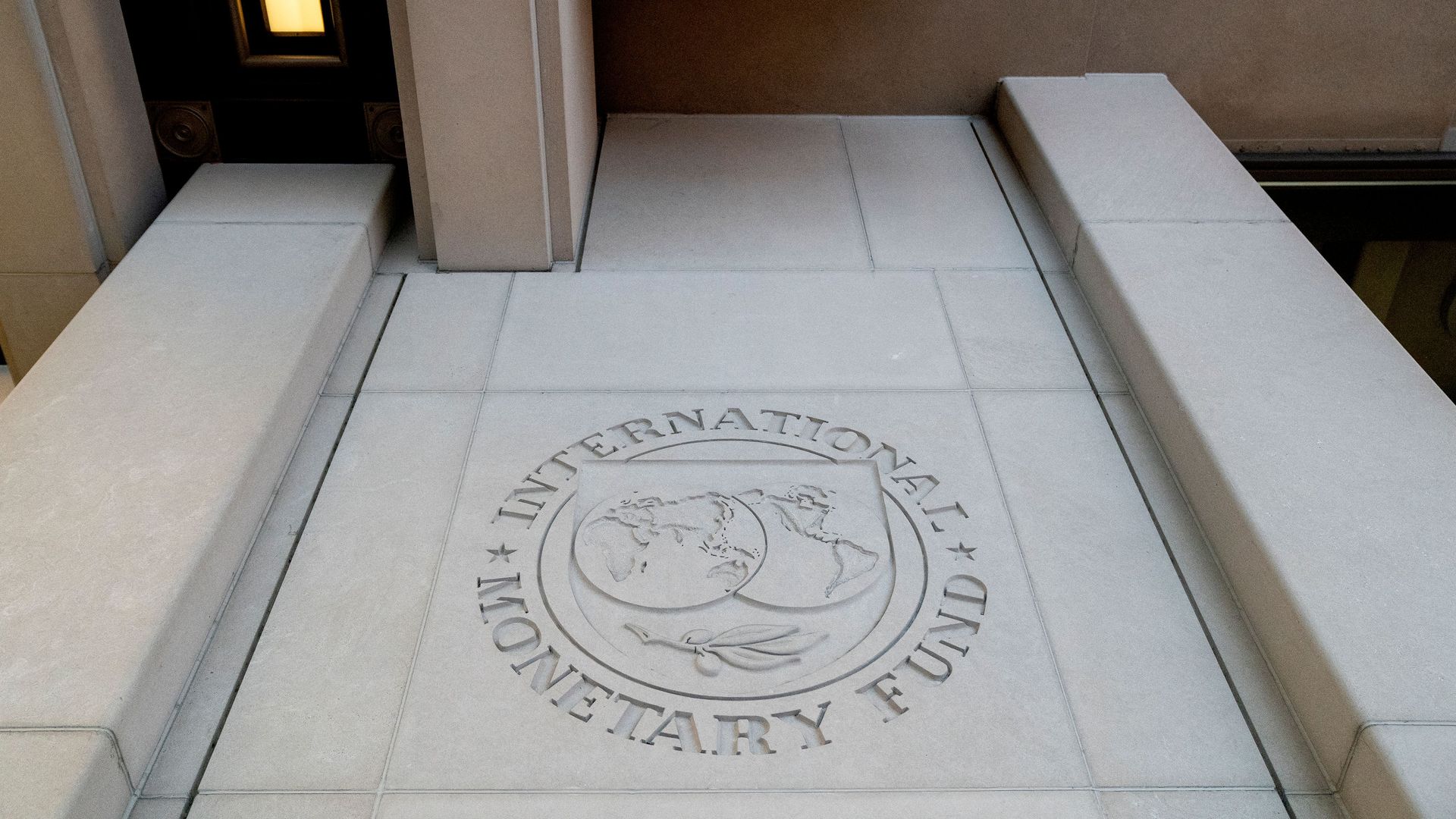 The seal for the International Monetary Fund (IMF) is seen in Washington, DC on January 10, 2022.