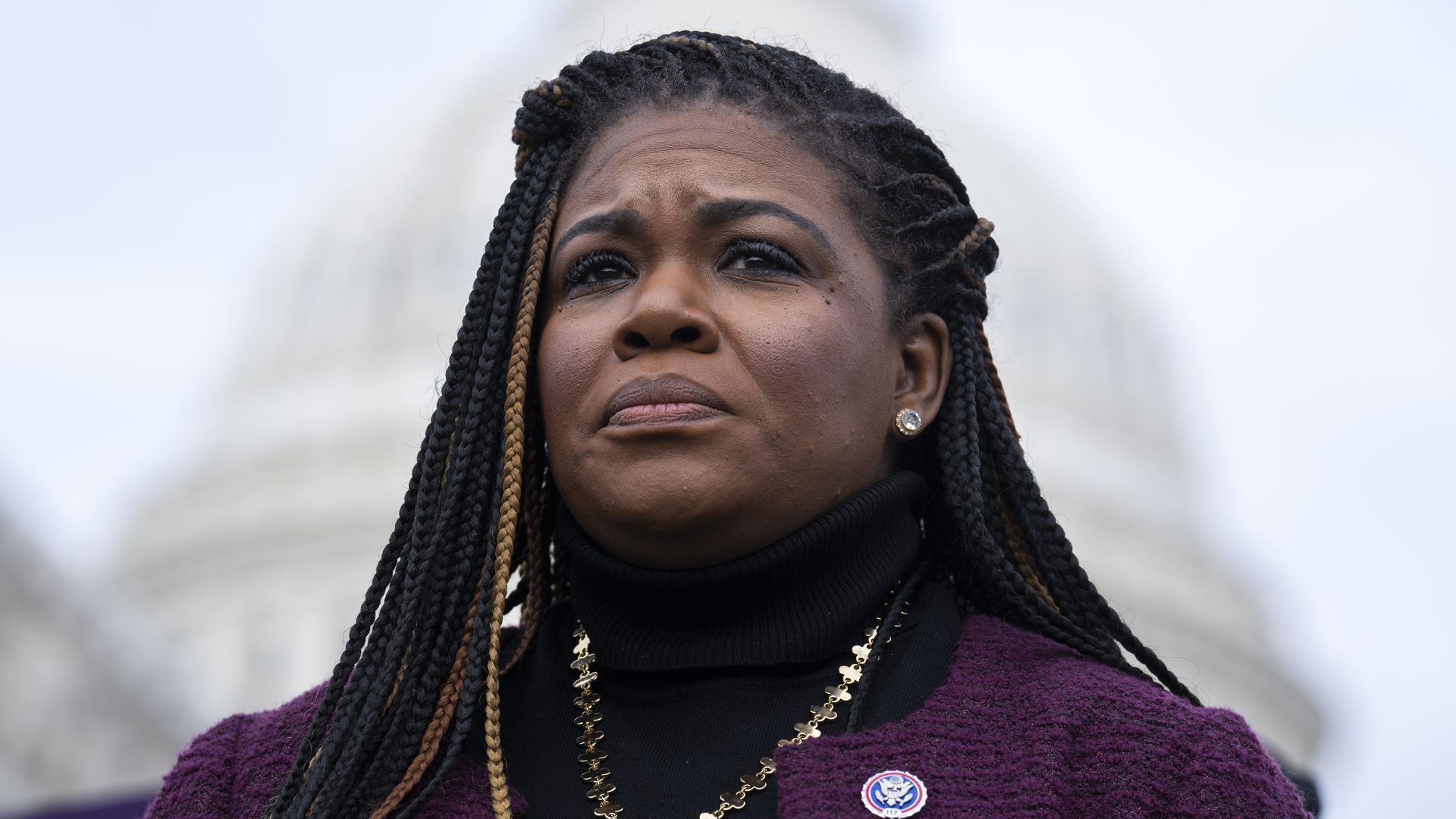 Rep. Cori Bush is seen in front of the U.S. Capitol.