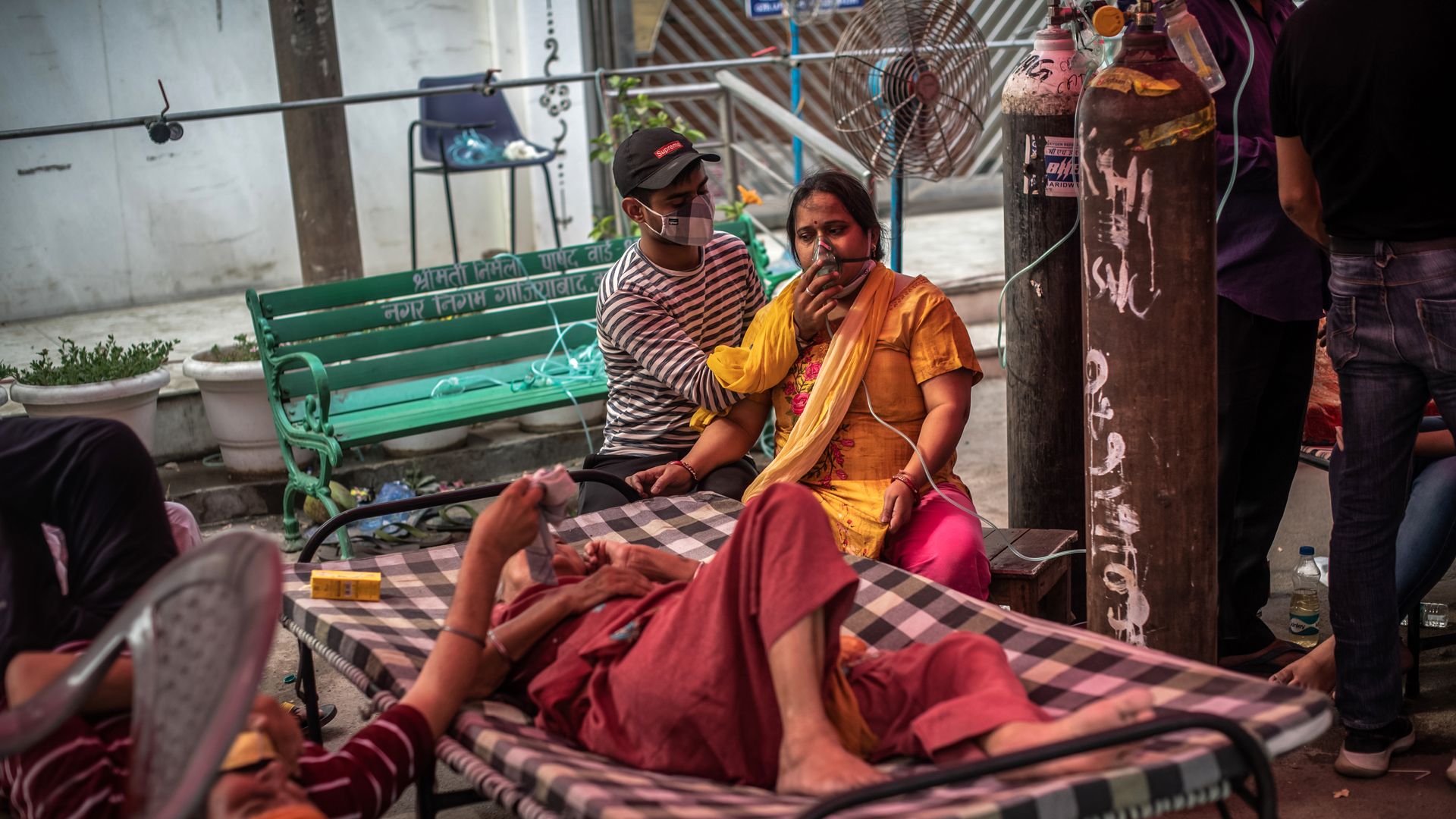  Patients suffering from Covid-19 are treated with free oxygen at a makeshift clinic outside the Shri Guru Singh Sabha Gurdwara on May 02, 2021 in Indirapuram, Uttar Pradesh, India. 