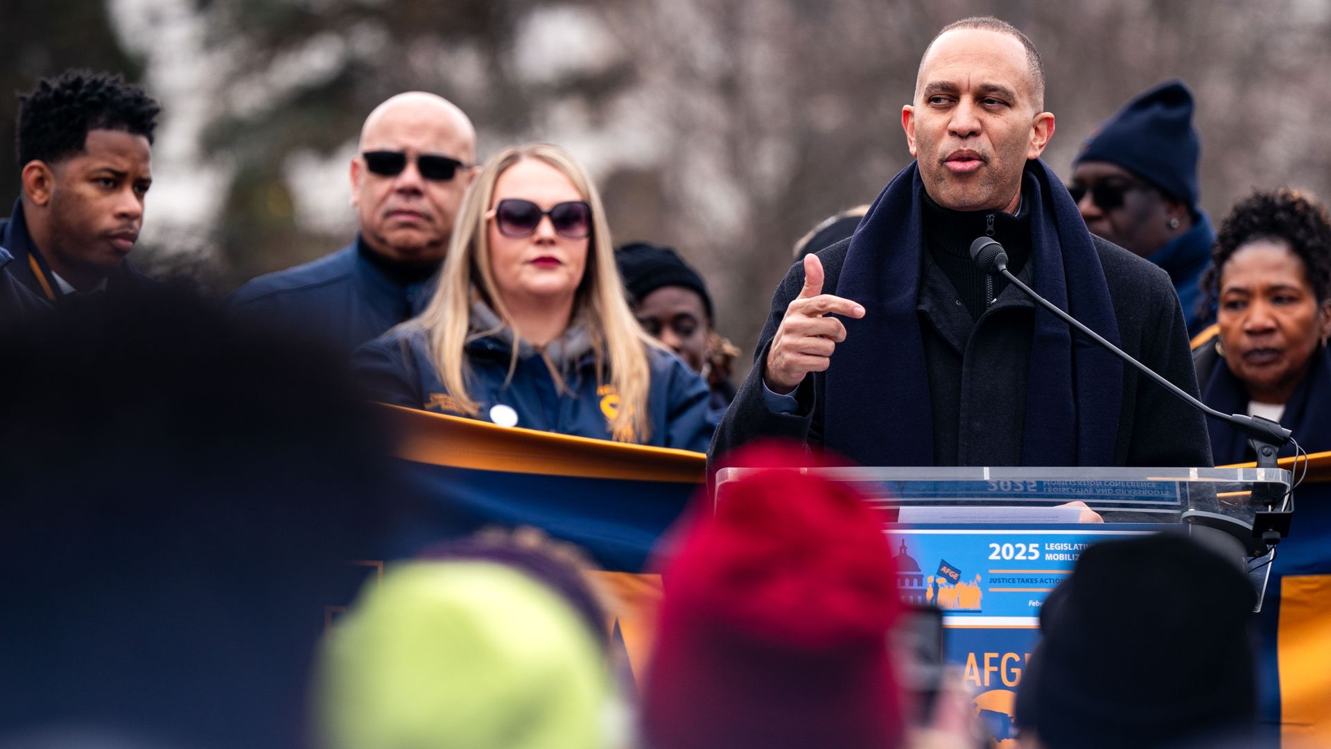 Hakeem Jeffries speaks before a crowd