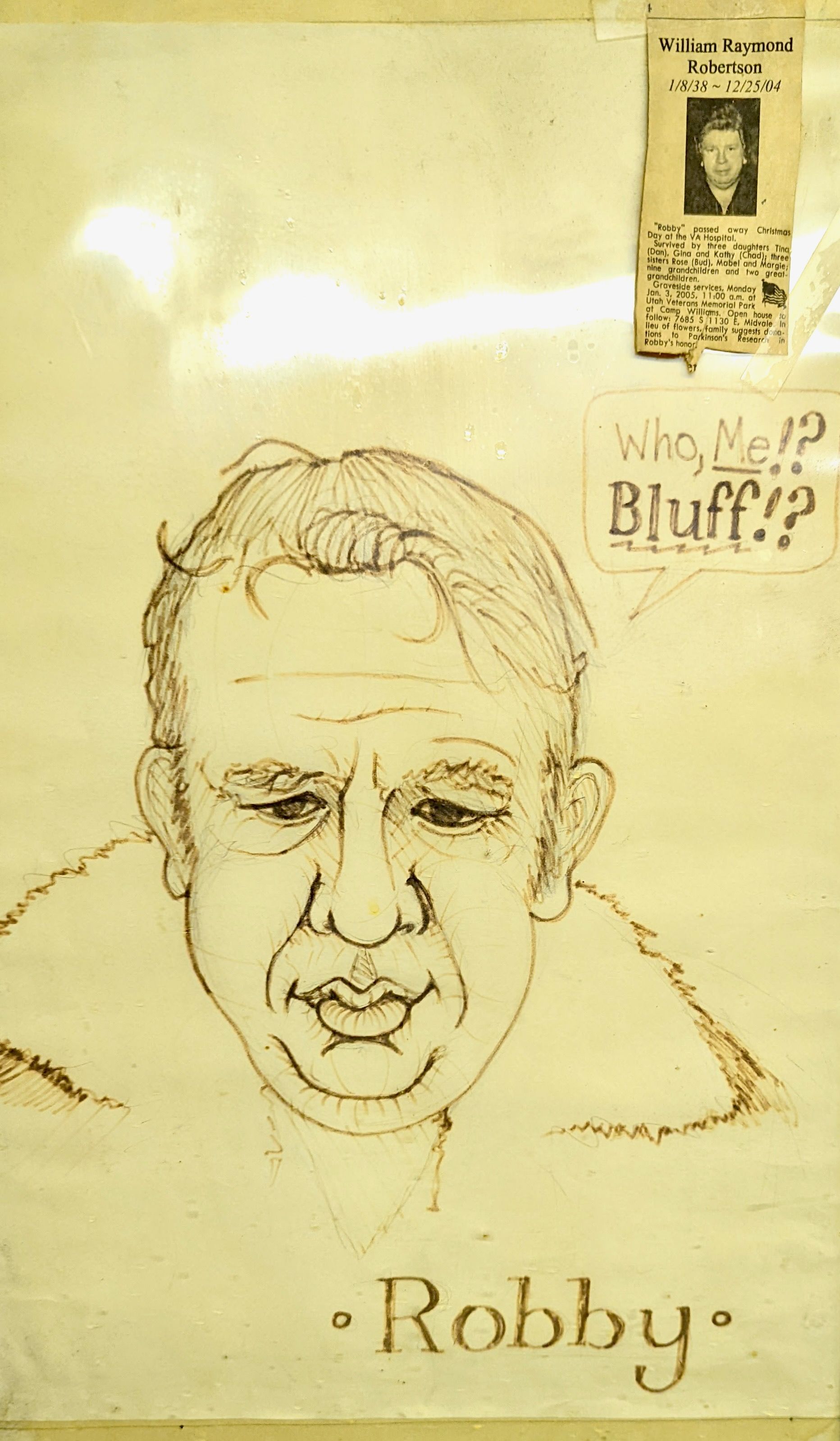 A drawn portrait shows a man's face, labeled "Robby" with the quote "Who, Me!? Bluff!!?" and his obituary taped to the corner. 