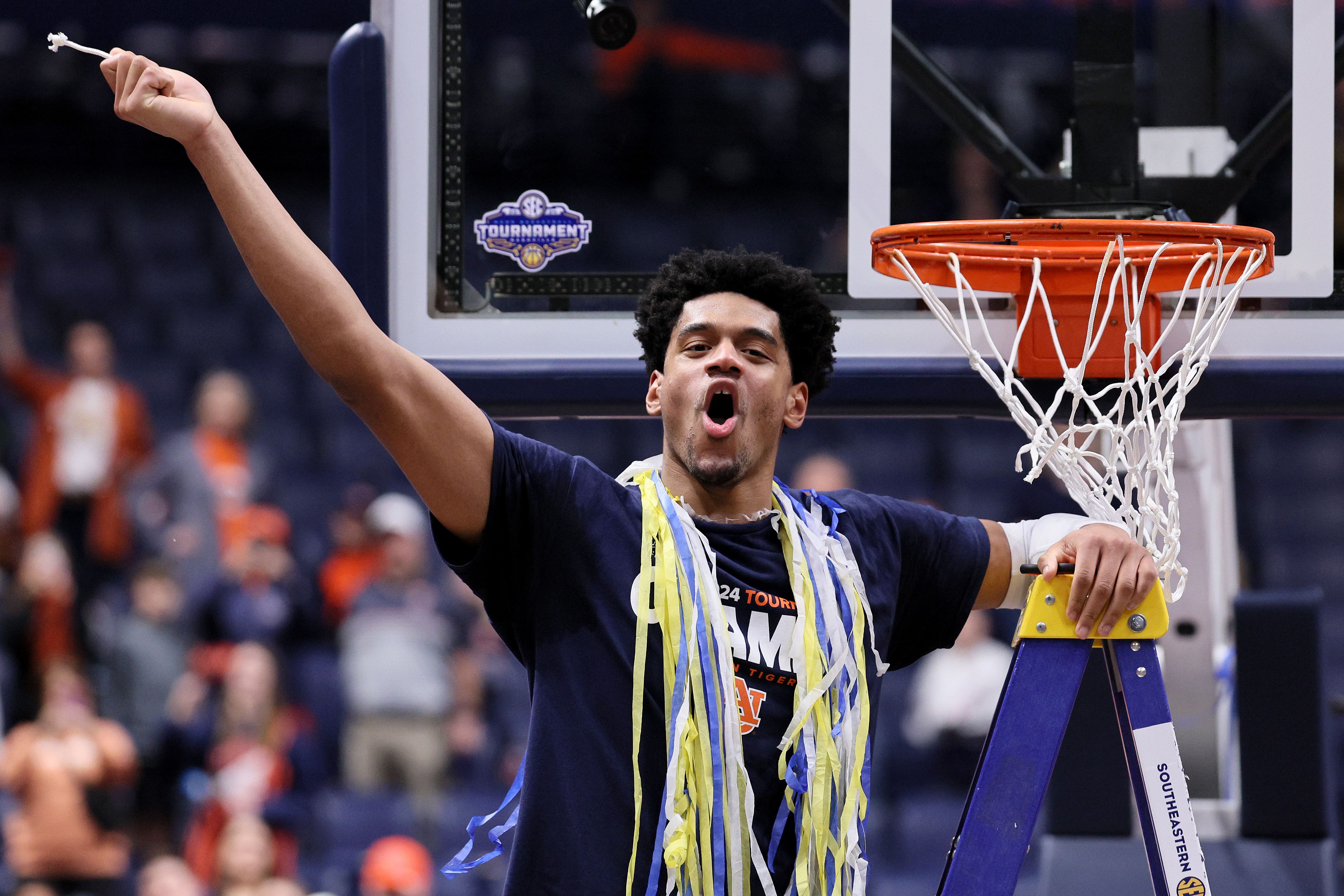 Auburn's Dylan Cardwell celebrates after beating Florida, 86-67, for the SEC championship in Nashville yesterday.
