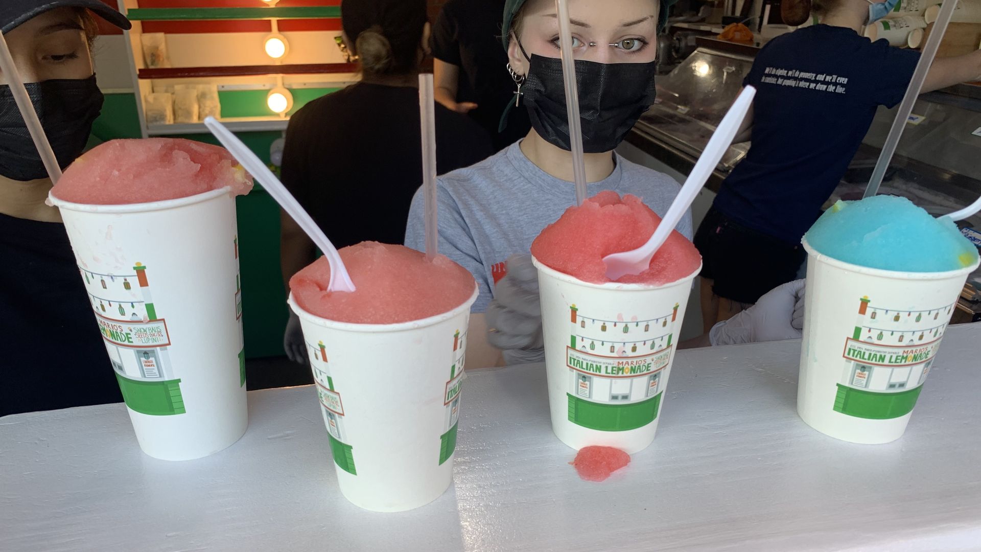Photo of Italian ice drinks on a counter.