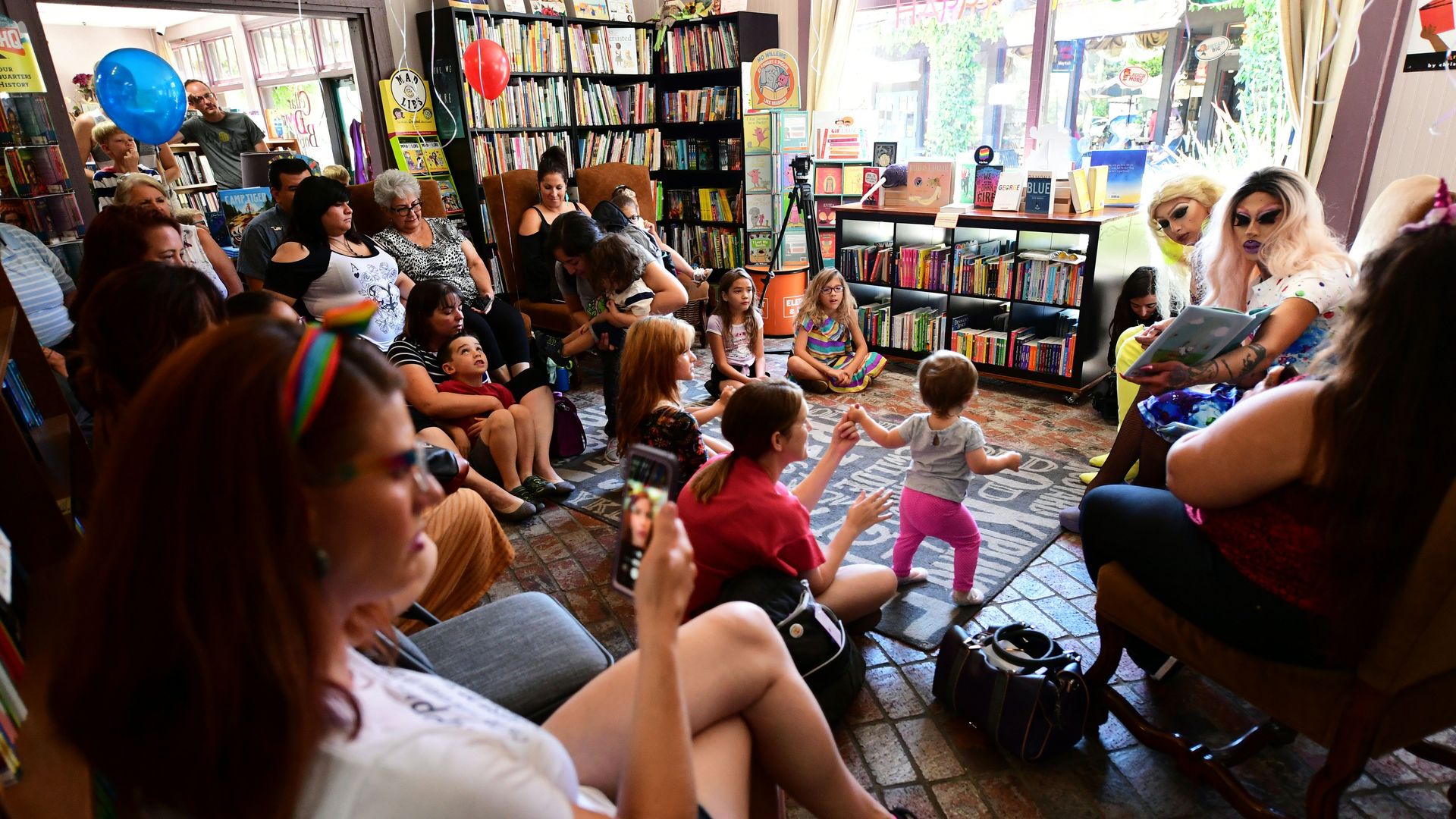 People gathered for Drag Queen Story Hour 