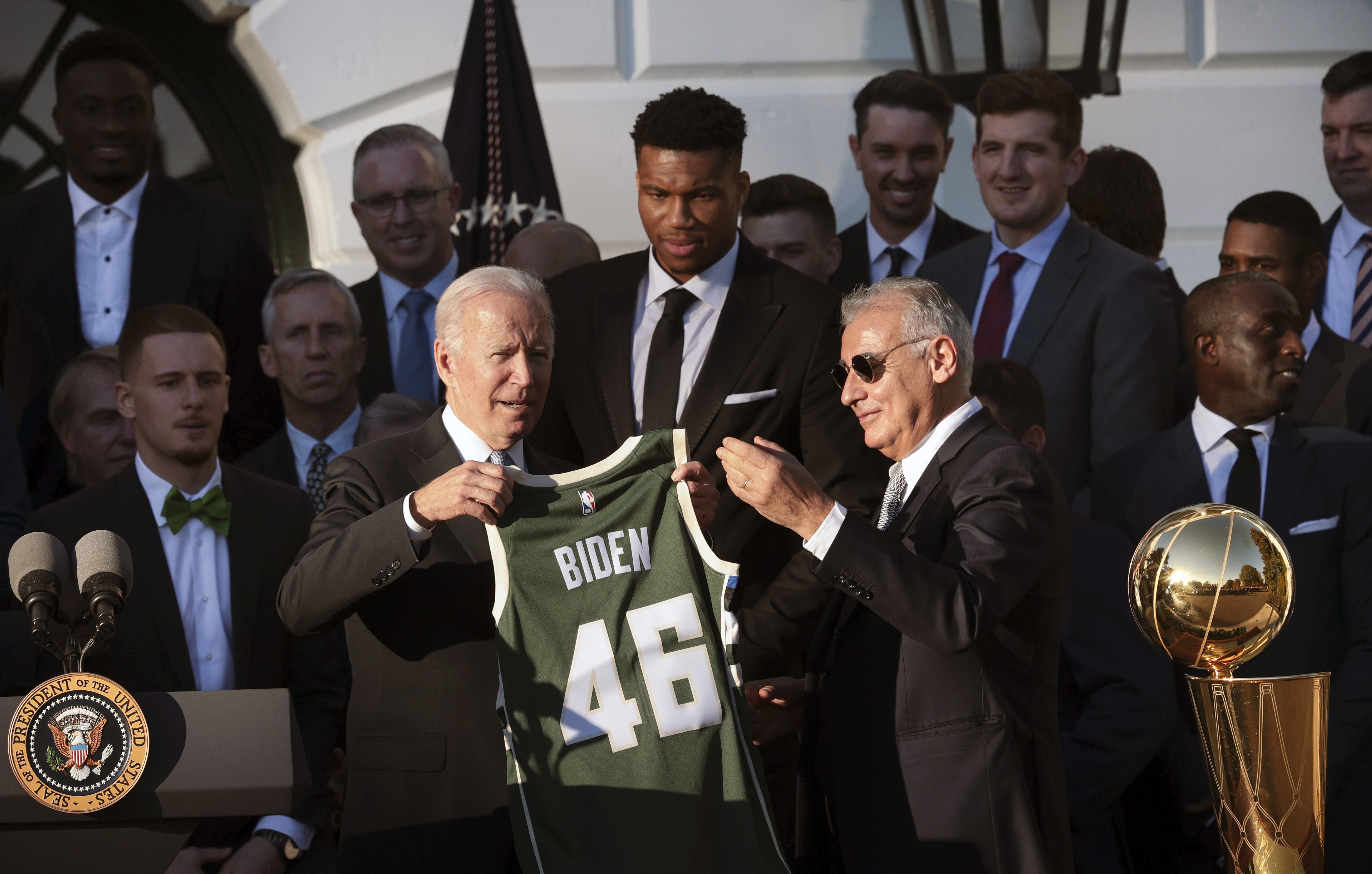 President Biden being presented with a commemorative Bucks Jersey