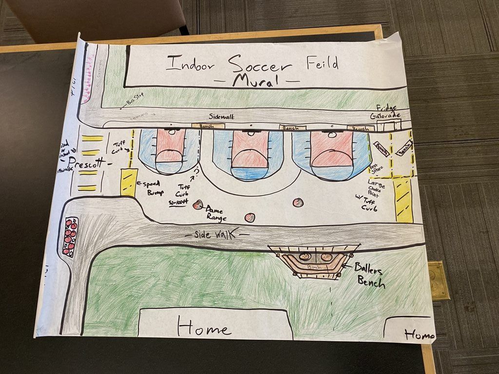A drawing of a mural of basketball courts painted on a street.