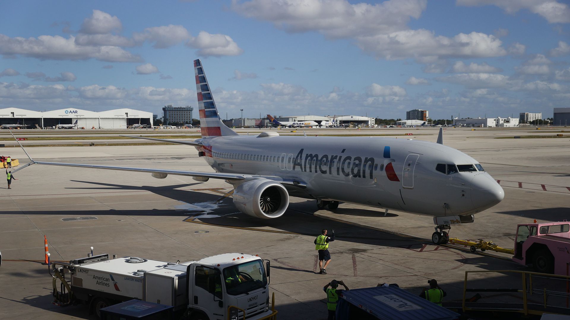 American Airlines flight 718, a Boeing 737 Max, is pushed back from its gate at Miami International Airport on its way to New York on December 29, 2020 in Miami, Florida. 