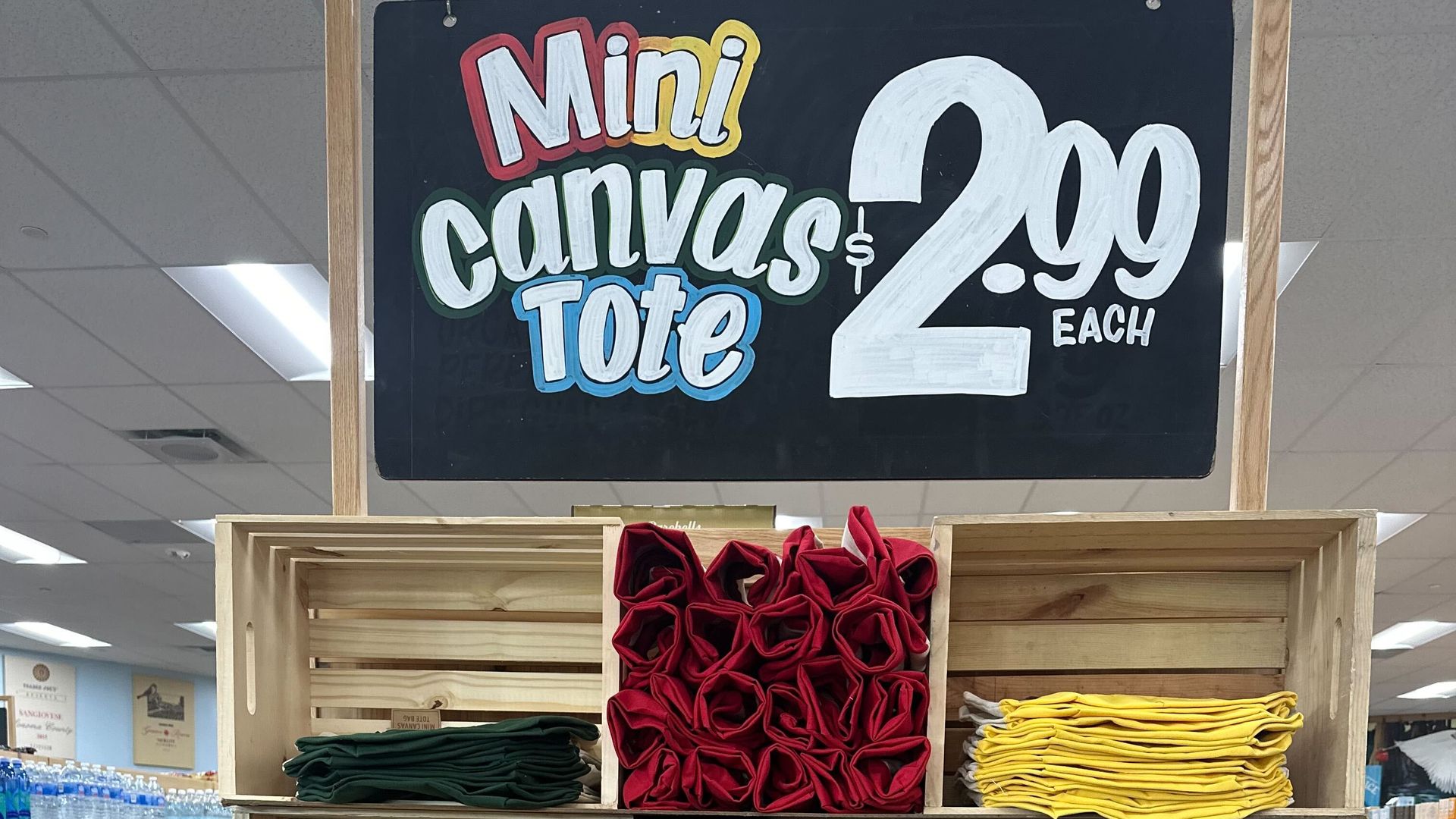 Store display with Mini Canvas Tote bags for $2.99 