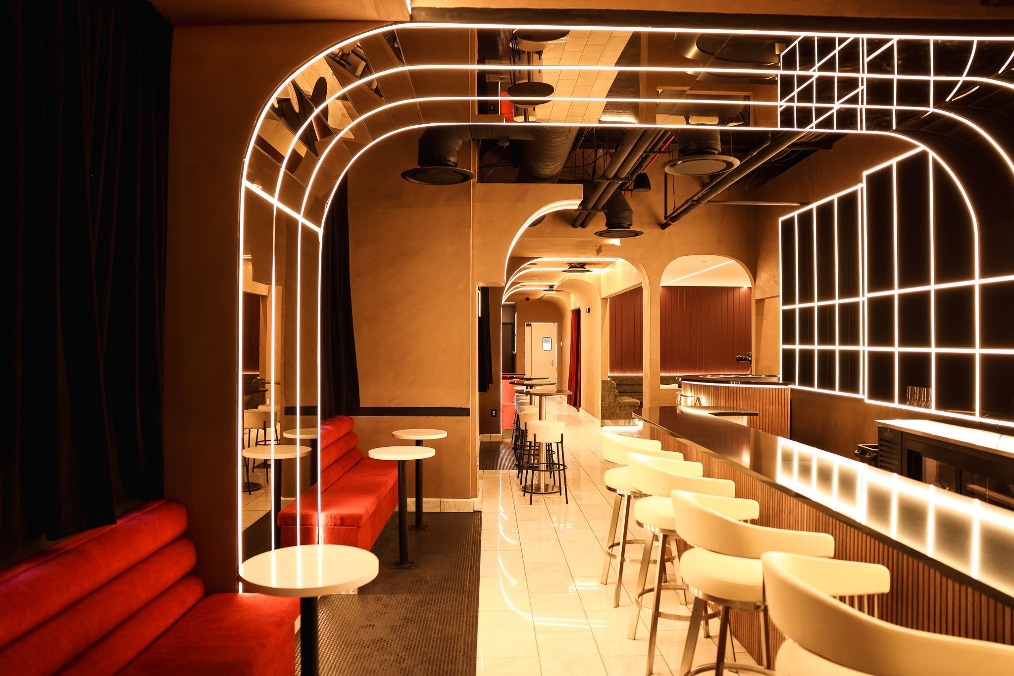 A glowing red and white bar space 