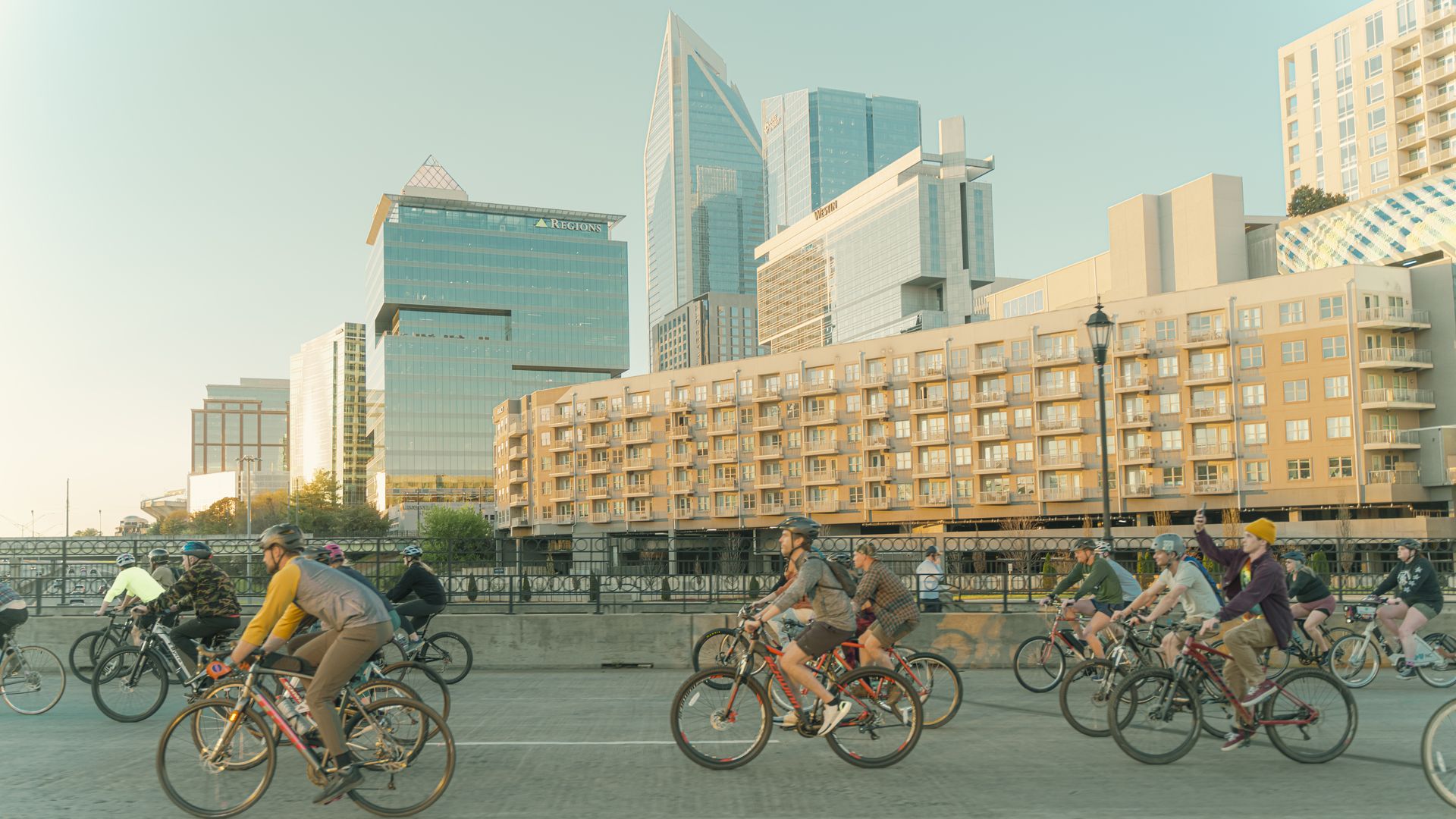 a group of cyclist on the street