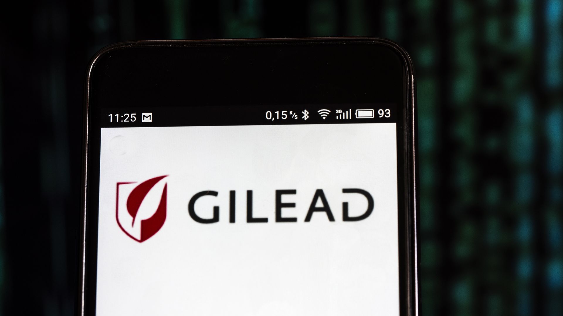 Gilead Sciences logo on a cell phone screen.