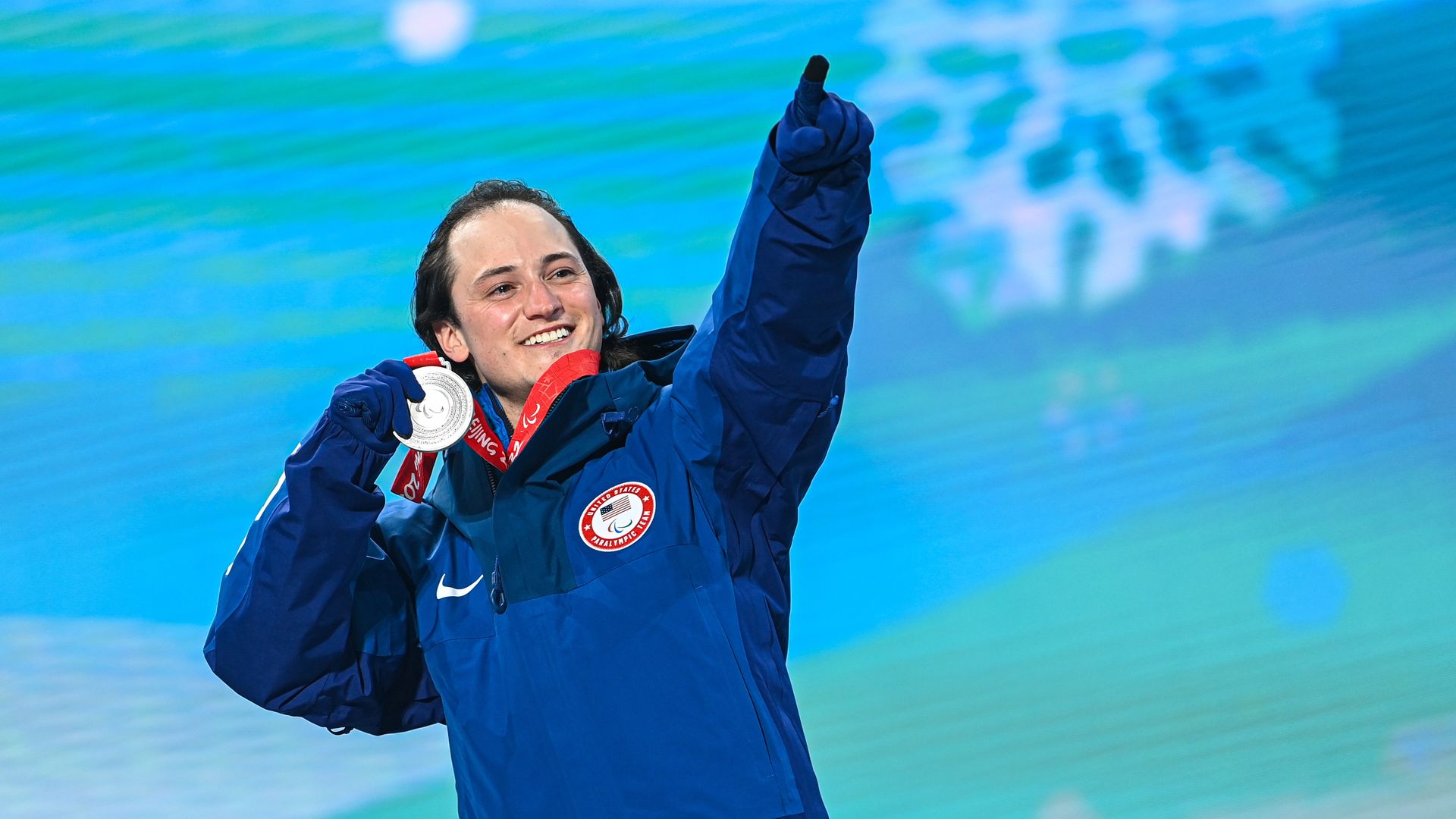 Thomas Walsh celebrates during the medal ceremony. Photo: Jiang Han/Xinhua via Getty Images
