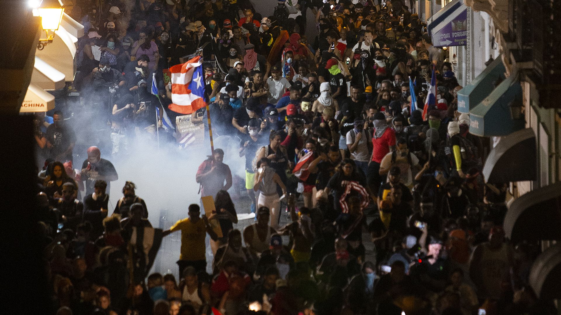 Police clash with protesters in front of the governor's mansion on July 23, 2019 in Old San Juan.