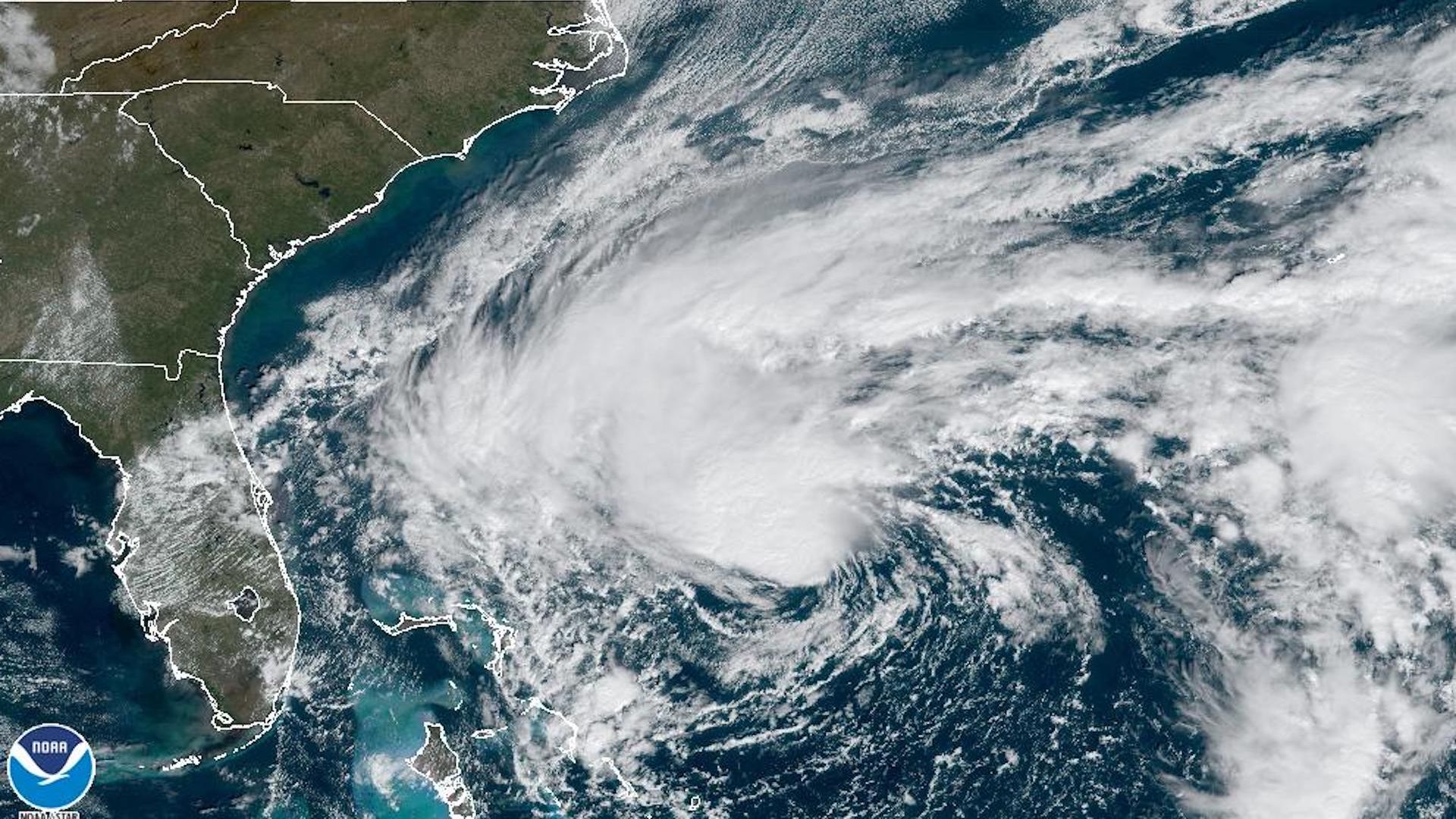 Satellite image showing Tropical Storm Nicole swirling to the east of Florida.