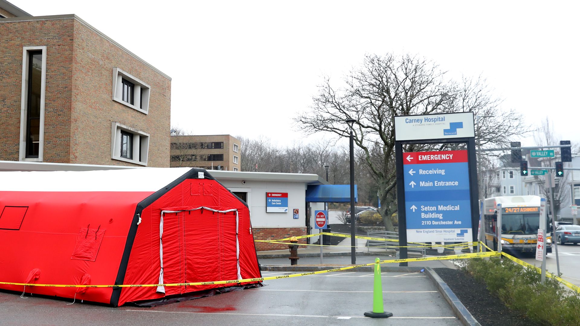 A red coronavirus testing tent stands outside Carney Hospital.