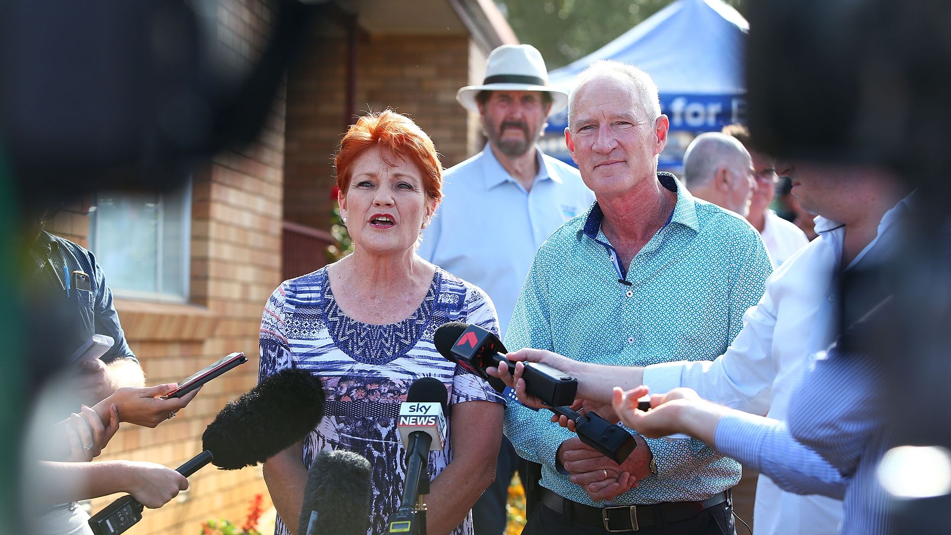One Nation leader Pauline Hanson and party official Steve Dickson address the media.