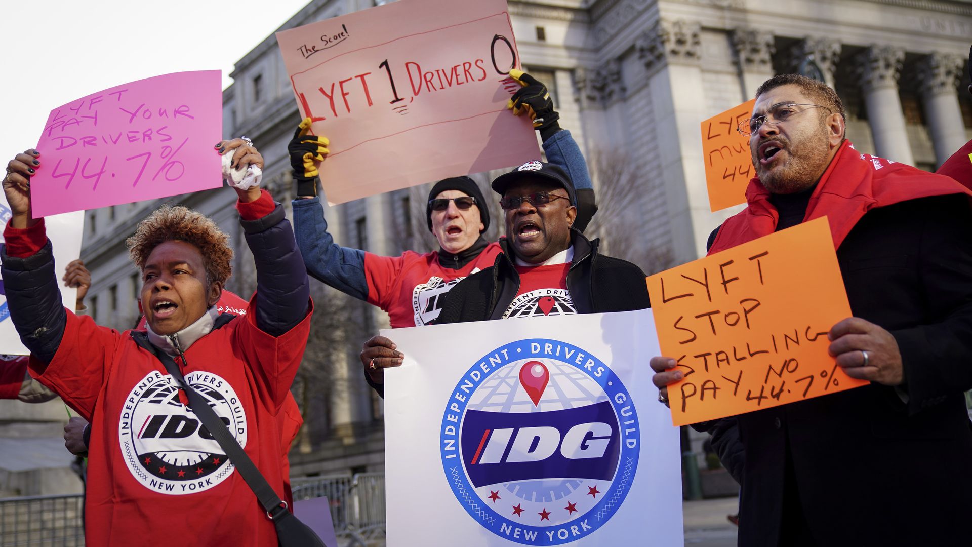 Members and supporters of the Independent Drivers Guild protest against Lyft’s minimum wage for drivers in New York City in March.