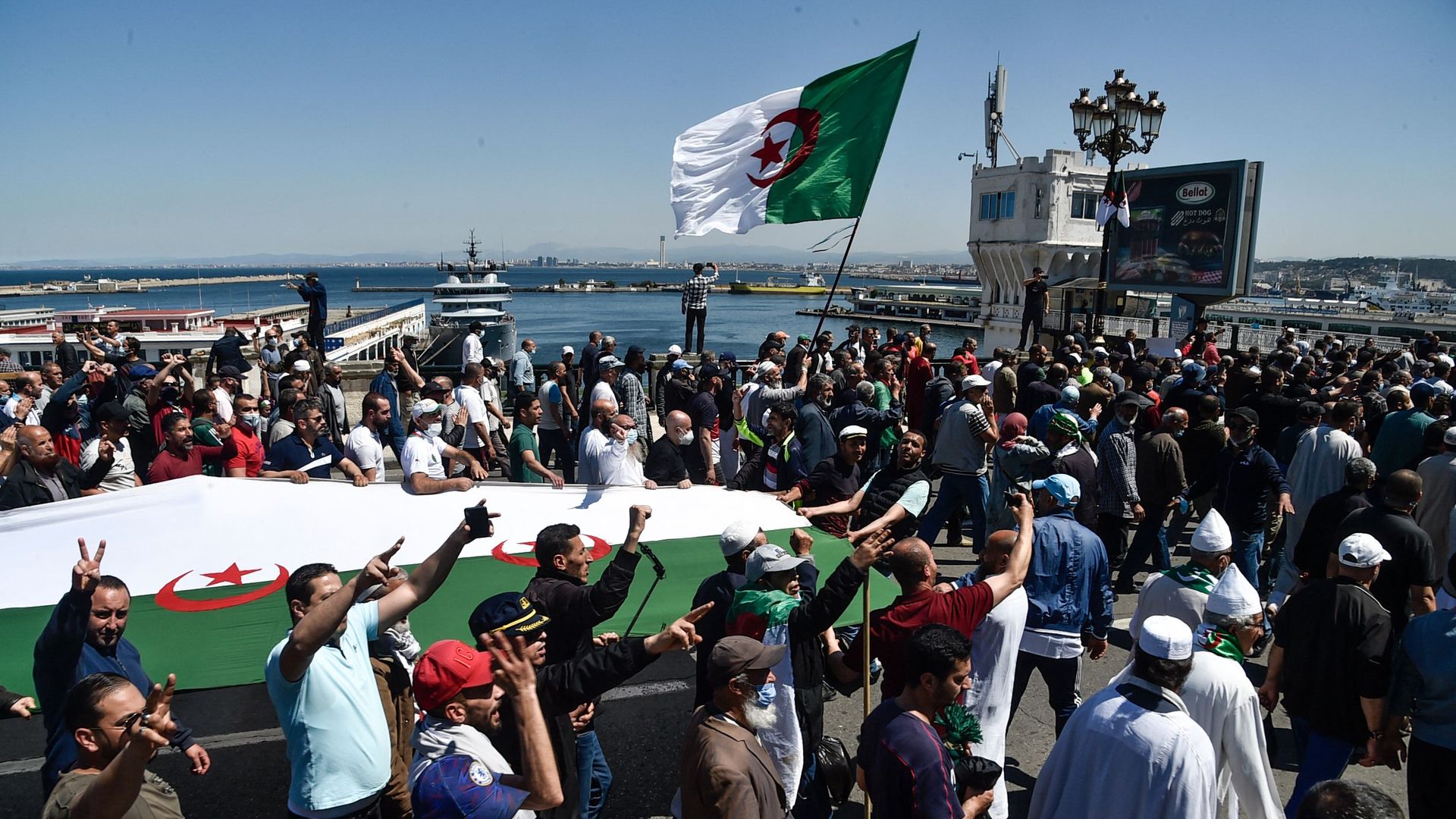 Algerians shout slogans during an anti-government demonstration in the capital Algiers on May 7, 2021