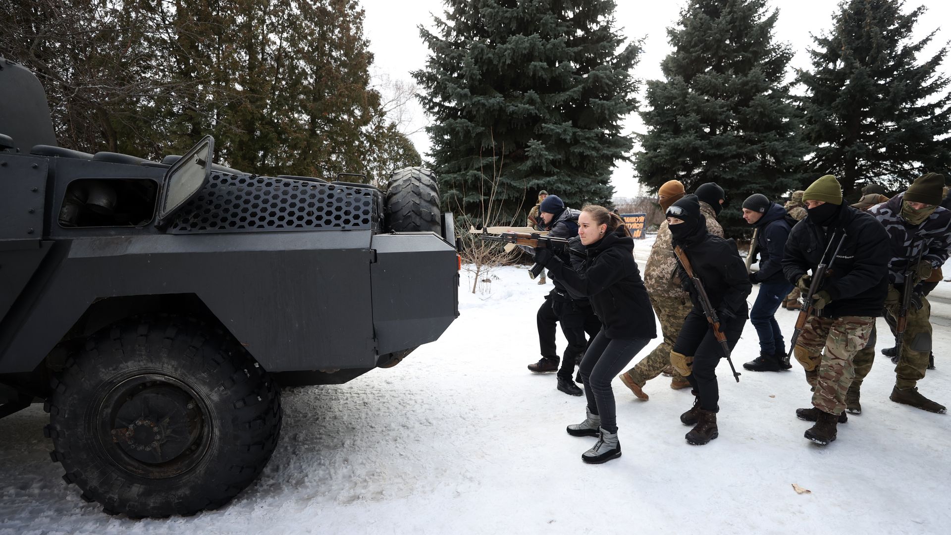 Ukrainian citizens are seen practicing to support the country's military against Russia.