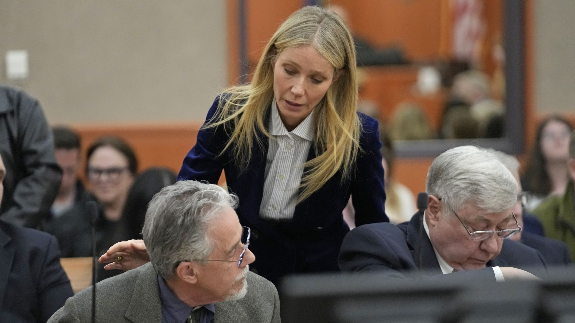 Actor Gwyneth Paltrow speaks with retired optometrist Terry Sanderson after the verdict was read in his $300,000 suit against her over a skiing accident.