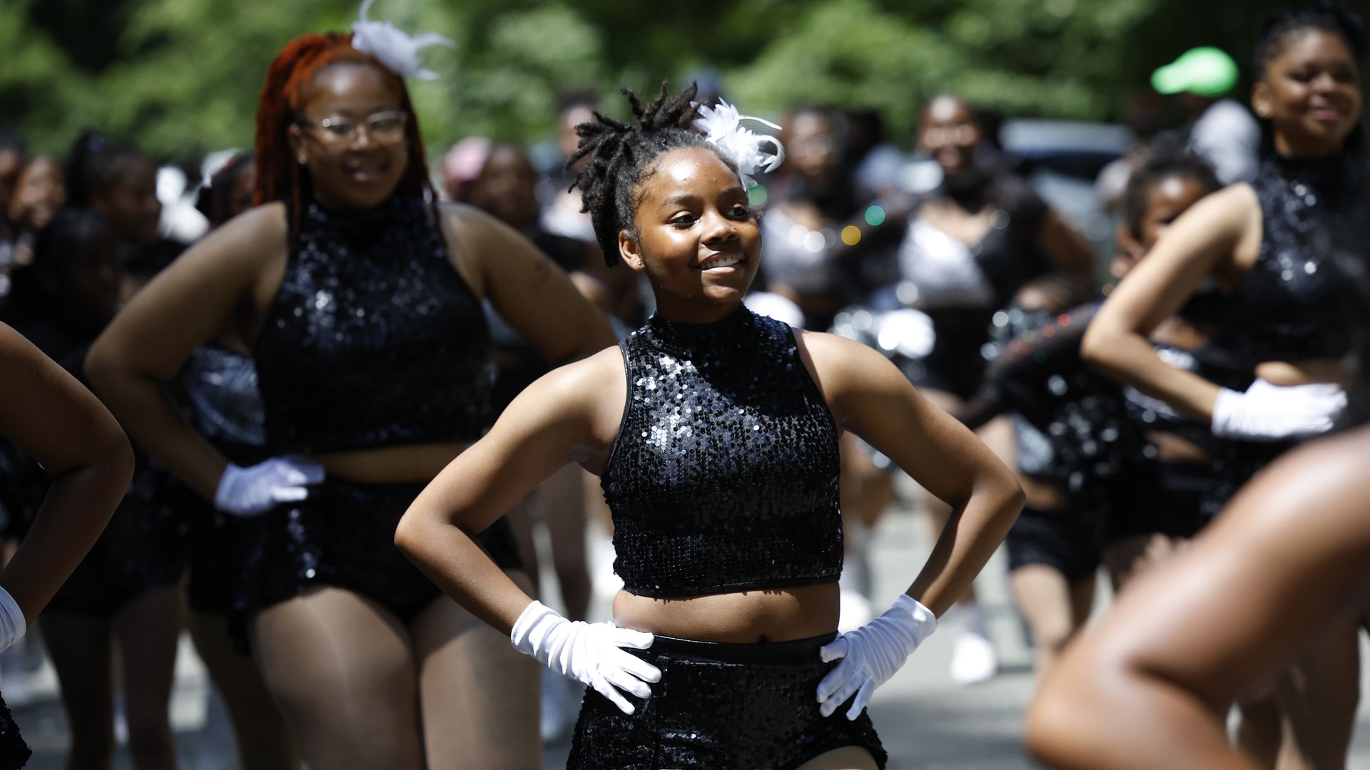 Members of the Limitless Dancing Warriorettes perform as they march in the Scotland Juneteenth Heritage Festival Parade at Cabin John Regional Park on June 19, 2024 in Potomac, Maryland.