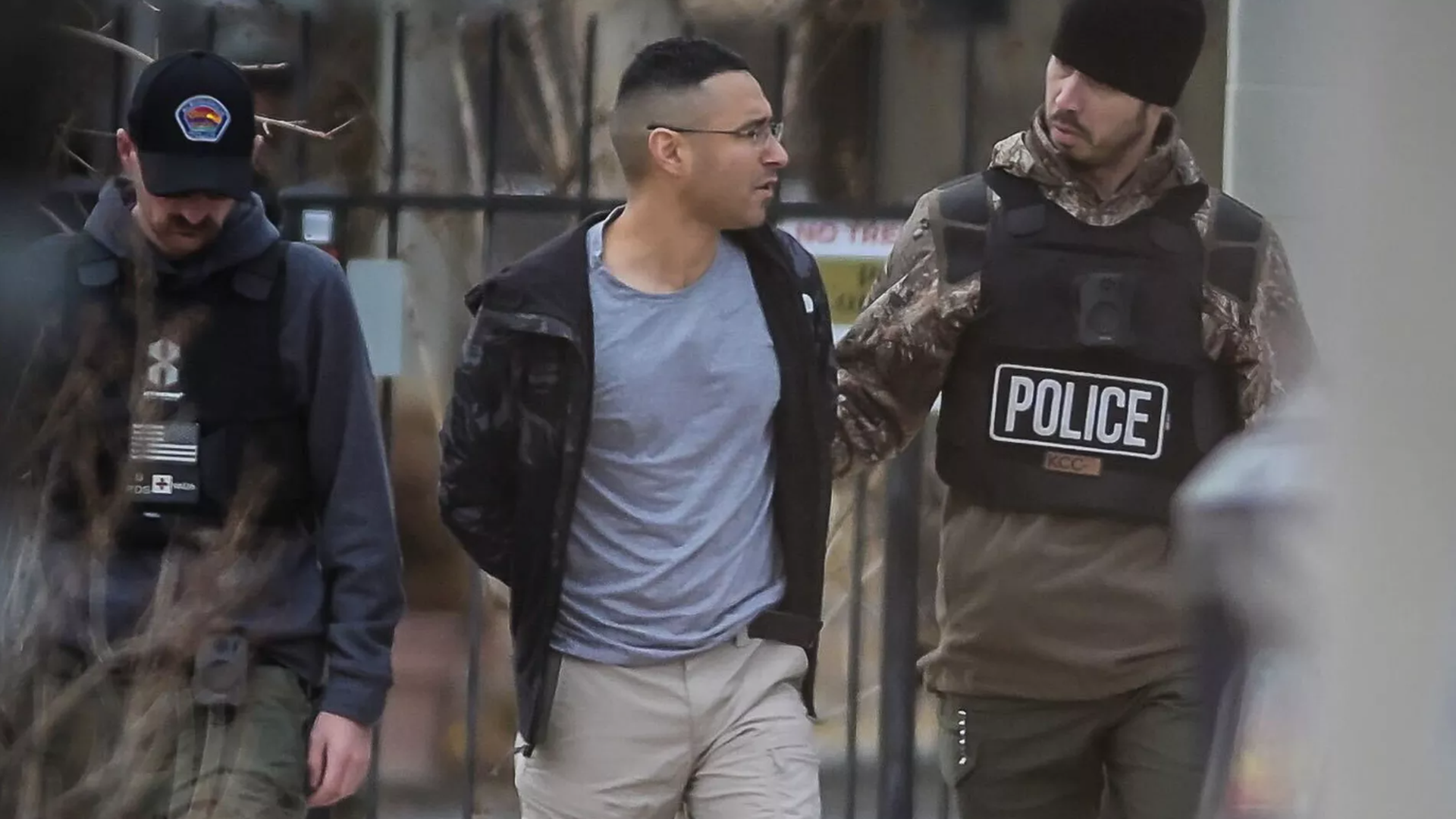 Albuquerque SWAT officers take Solomon Peña into custody Monday in Southwest Albuquerque.