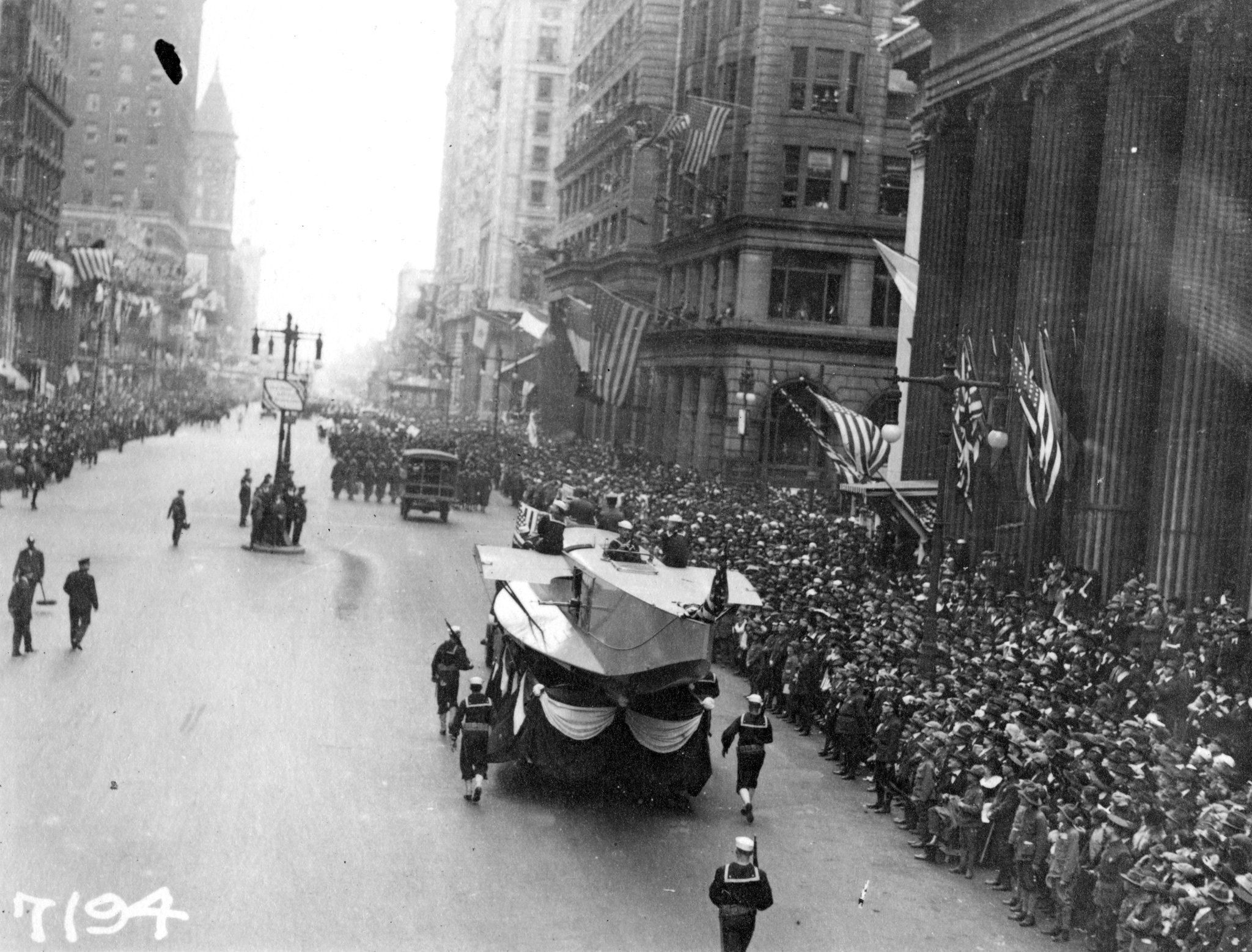 Philadelphia residents pack the streets for a wartime parade.