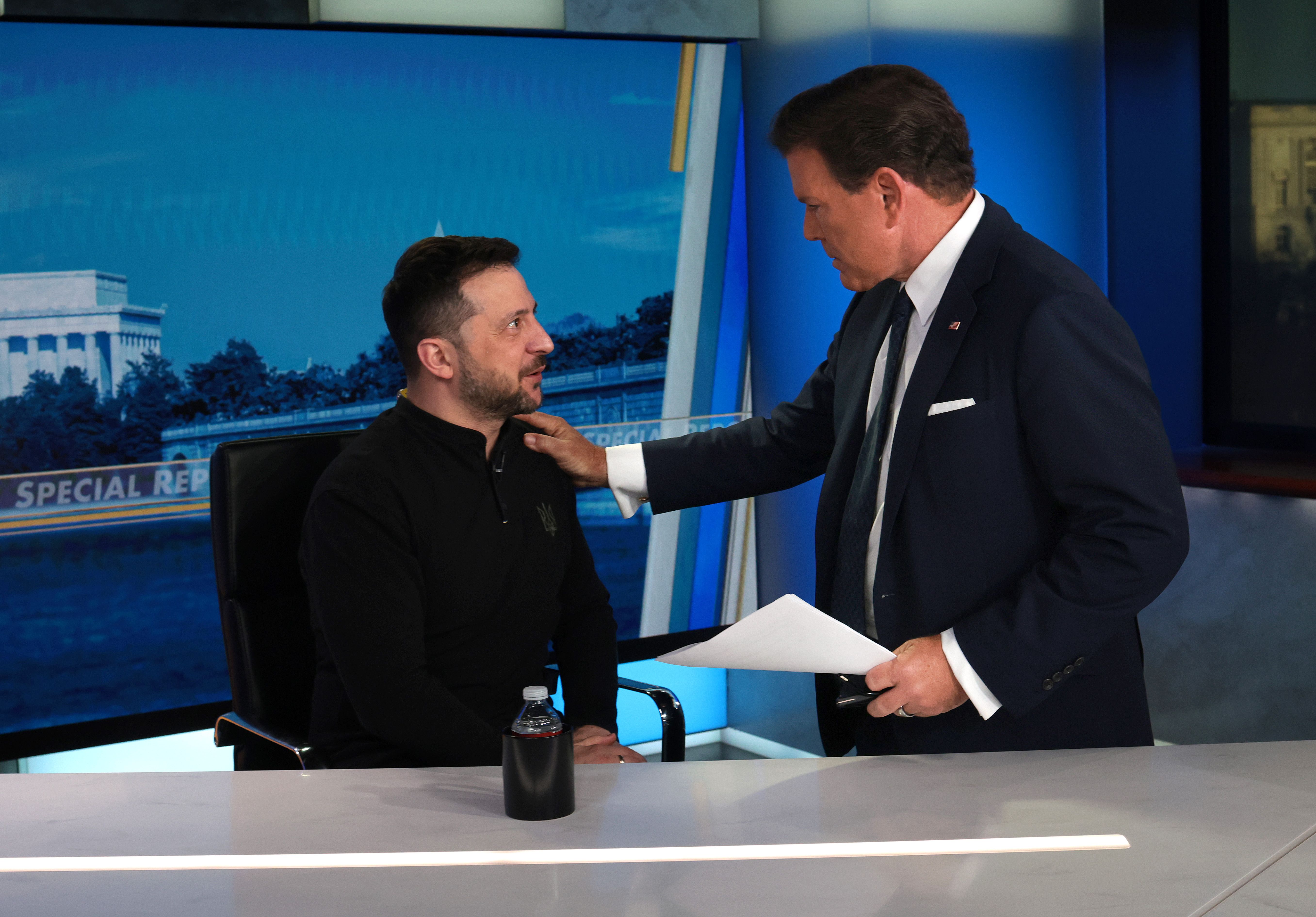 WASHINGTON, DC - FEBRUARY 28: Ukrainian President Volodymyr Zelensky speaks with Fox News Chief Political Anchor Bret Baier prior to an interview on Special Report With Bret Baier at the Fox News studios on February 28, 2025 in Washington, DC. Zelensky is expected to address his heated Oval Office m