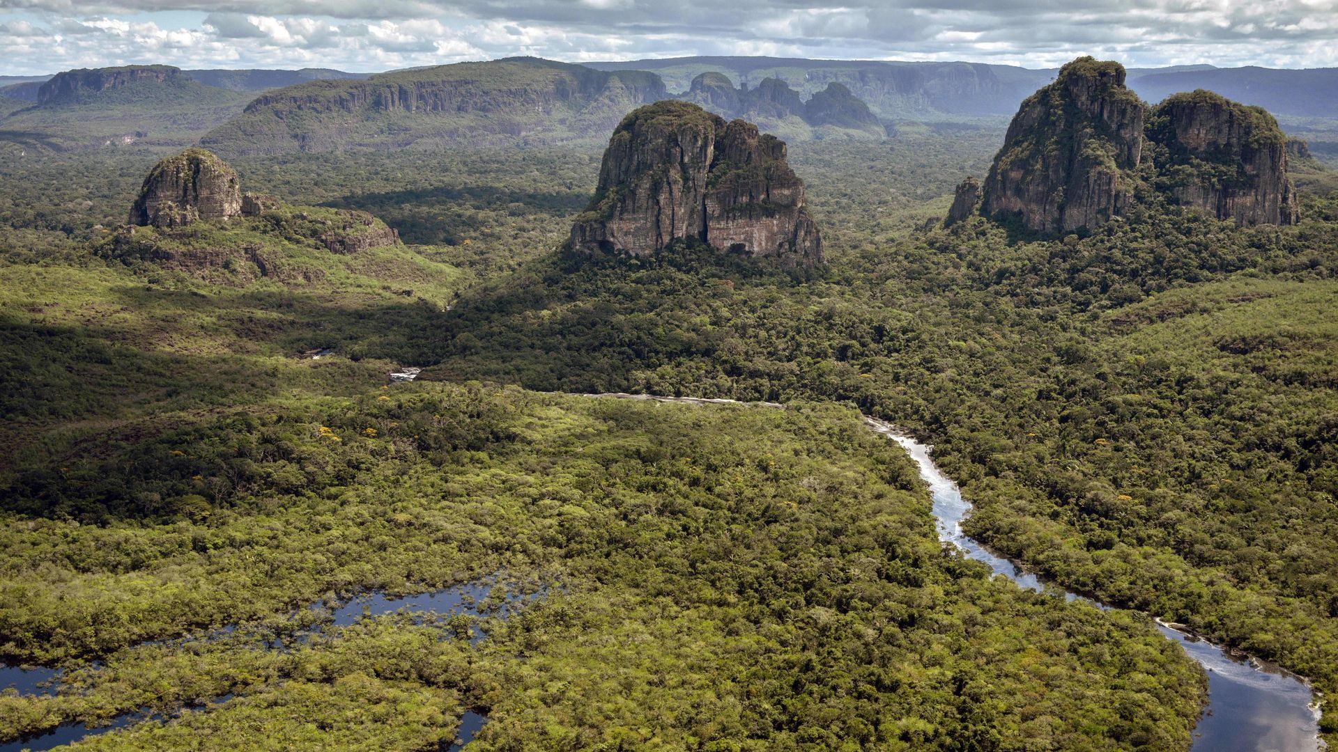 Aerial photo of rivers and mountains in the Amazon rainforest