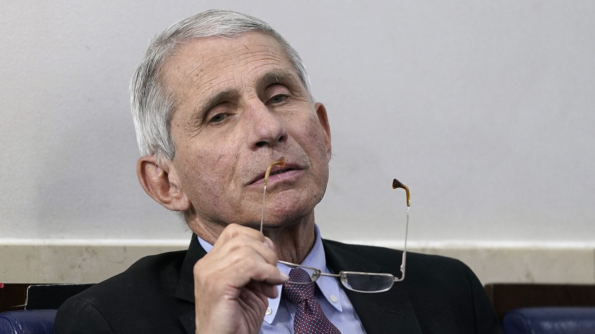 Anthony Fauci (R), director of the National Institute of Allergy and Infectious Diseases, participates in the daily coronavirus task force briefing