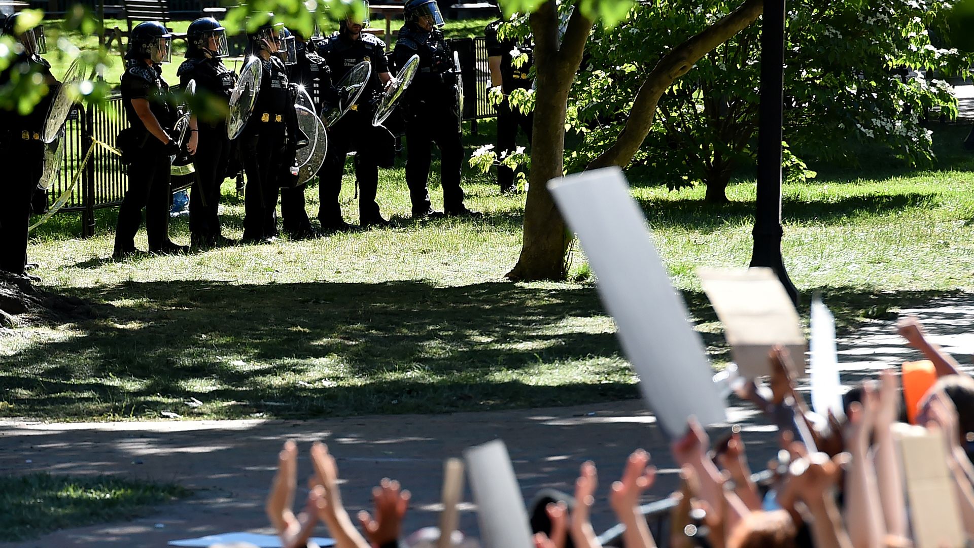 Police watch inside Lafayette Square near the White House in Washington, DC on June 1, 2020